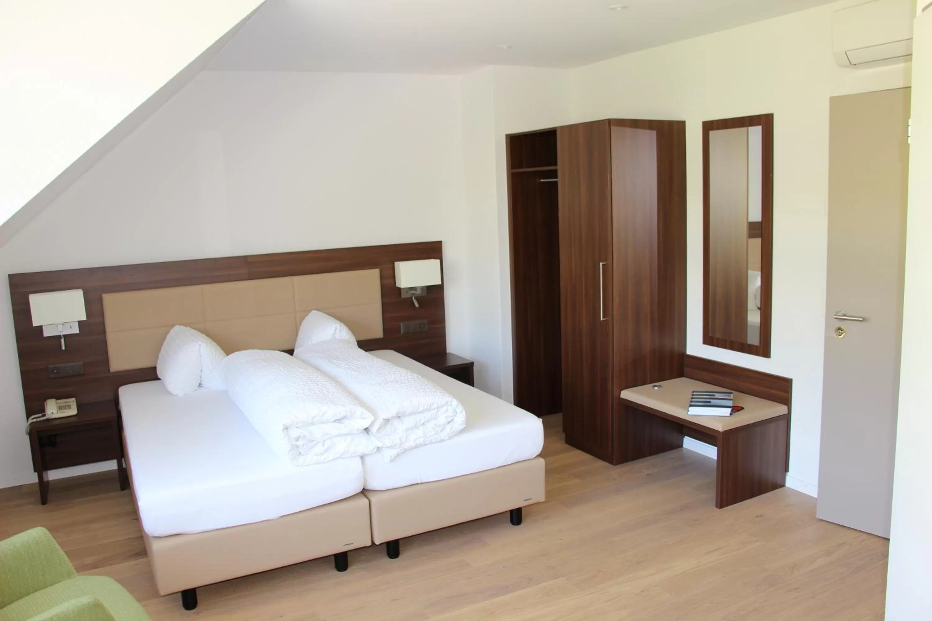 Photo of the whole room, Bed in Seehotel Delphin