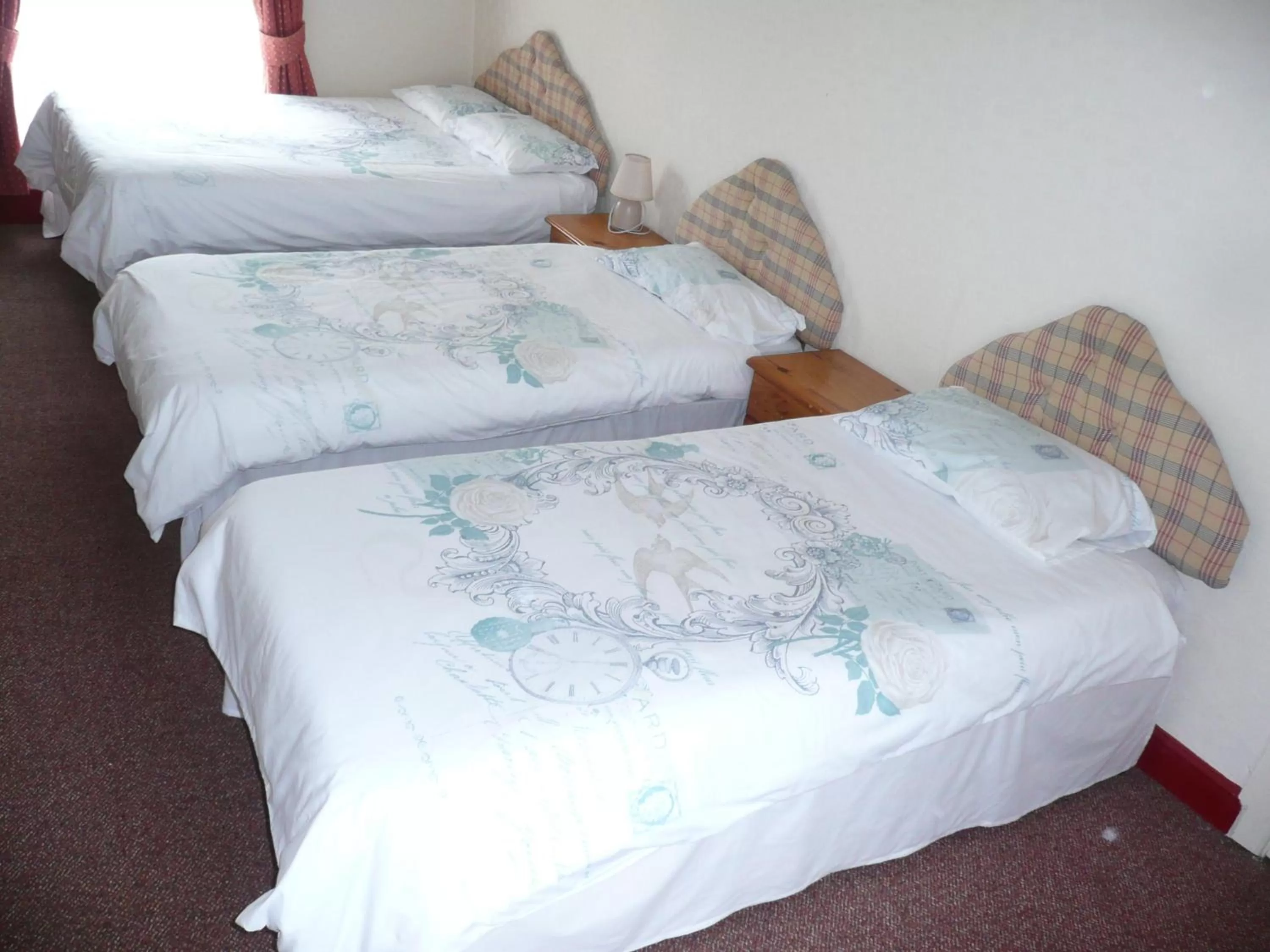 Bed in Beijing Dragon Hotel