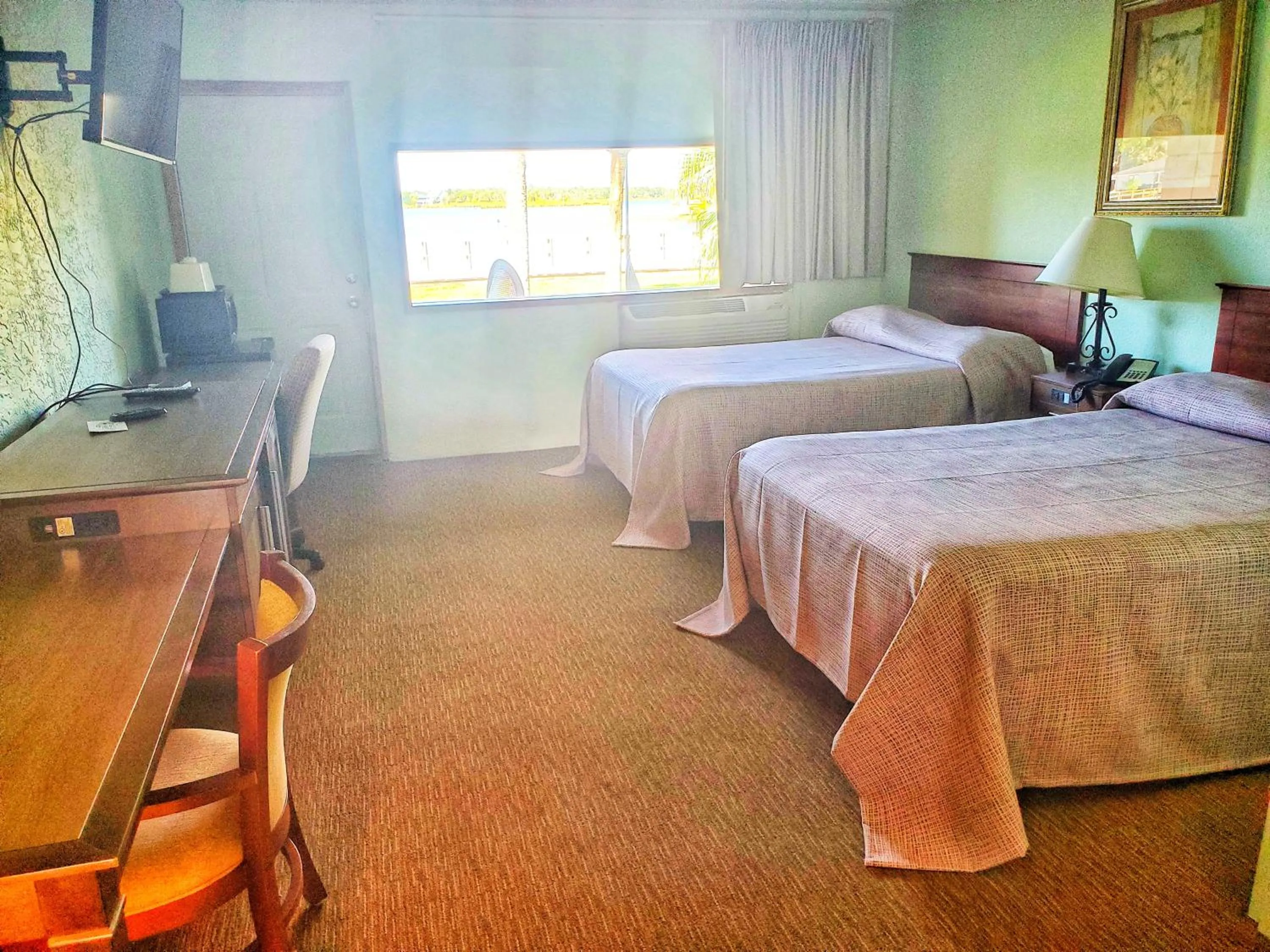 Patio, Bed in The Port Hotel and Marina