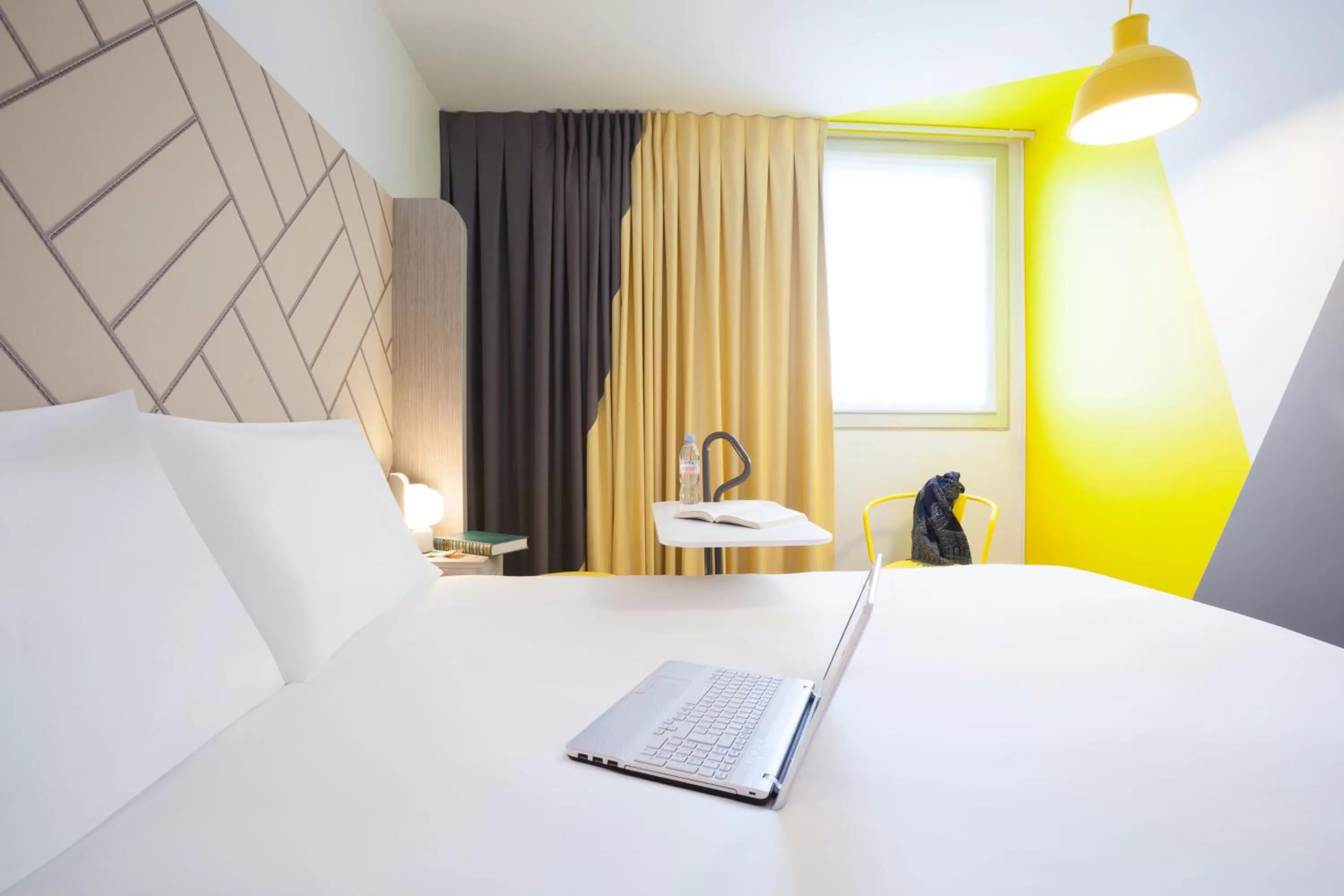 Bed in Ibis Styles Paris Massena Olympiades