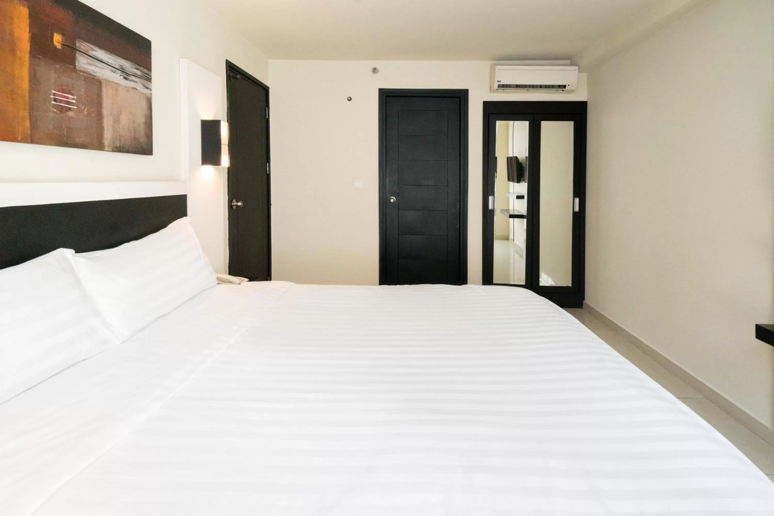 Bed in Aston Denpasar Hotel & Convention