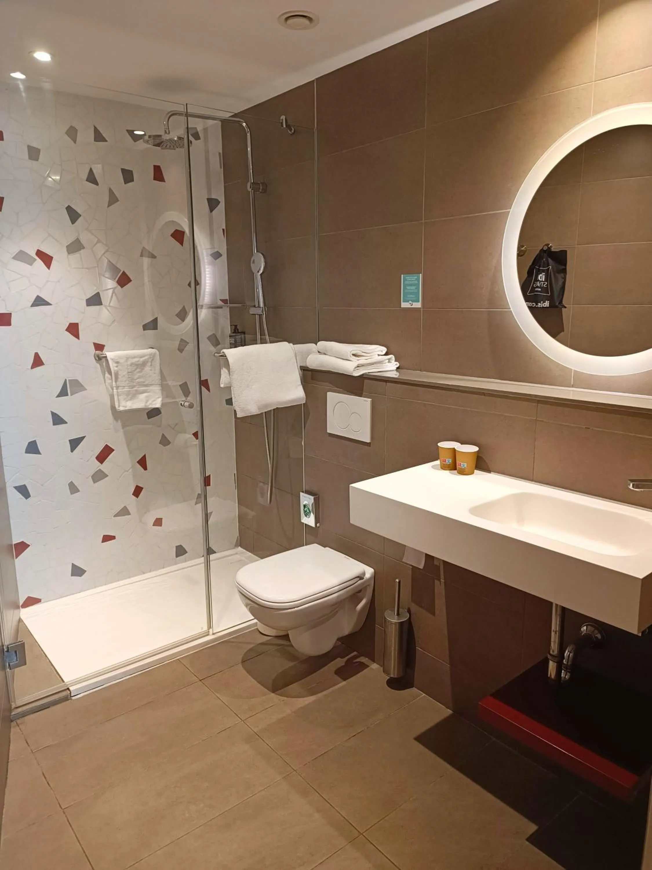 Bathroom in ibis Styles Barcelona City Bogatell