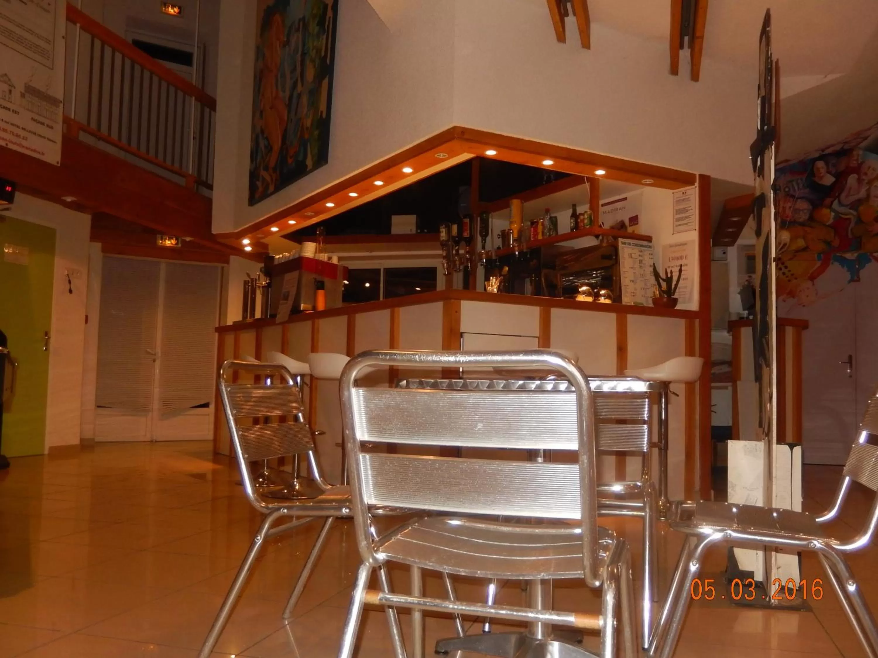 Lounge or bar in Hôtel Eco Logis Espace Bellevue