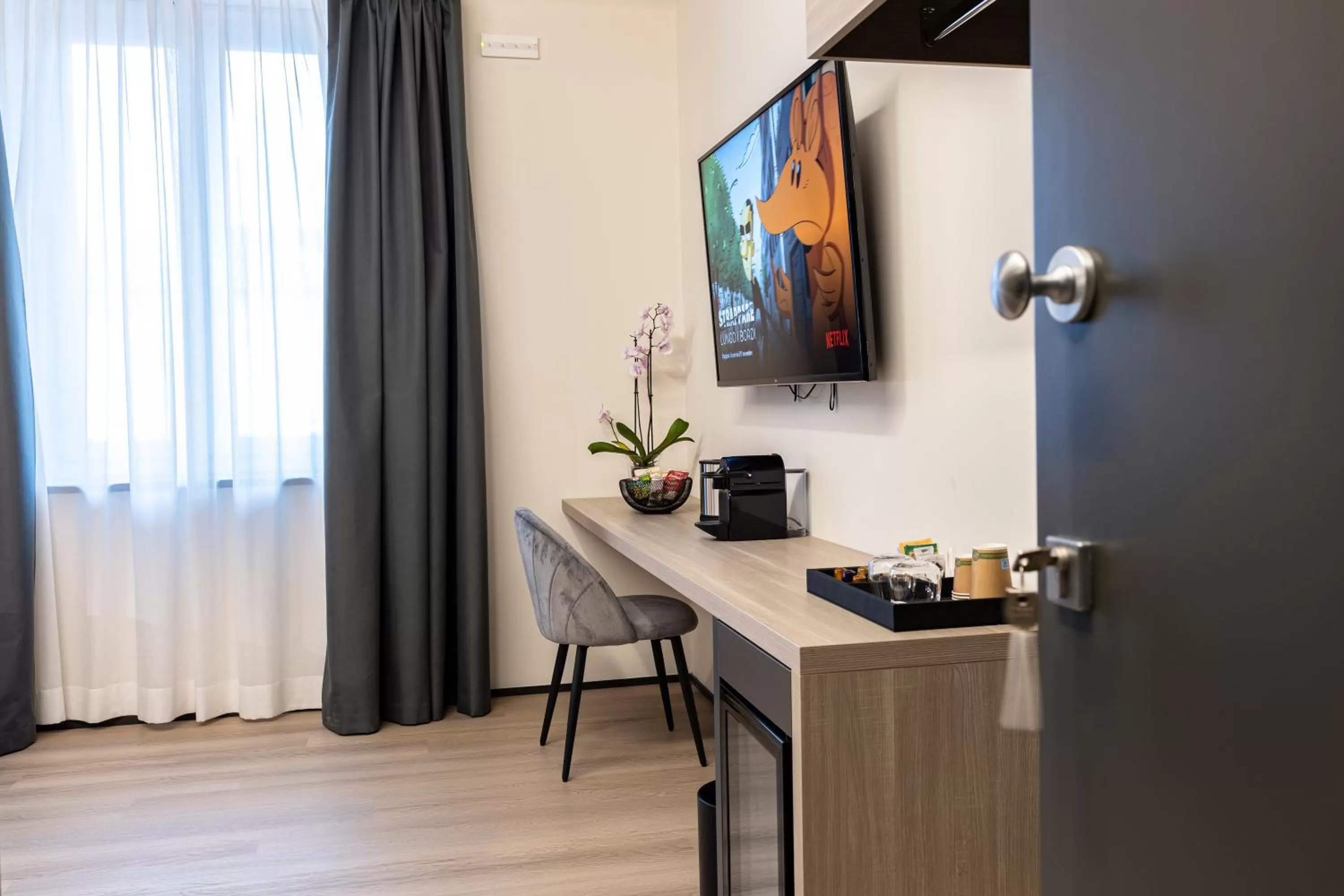 TV and multimedia, TV/Entertainment Center in Corso 84 Luxury Suites