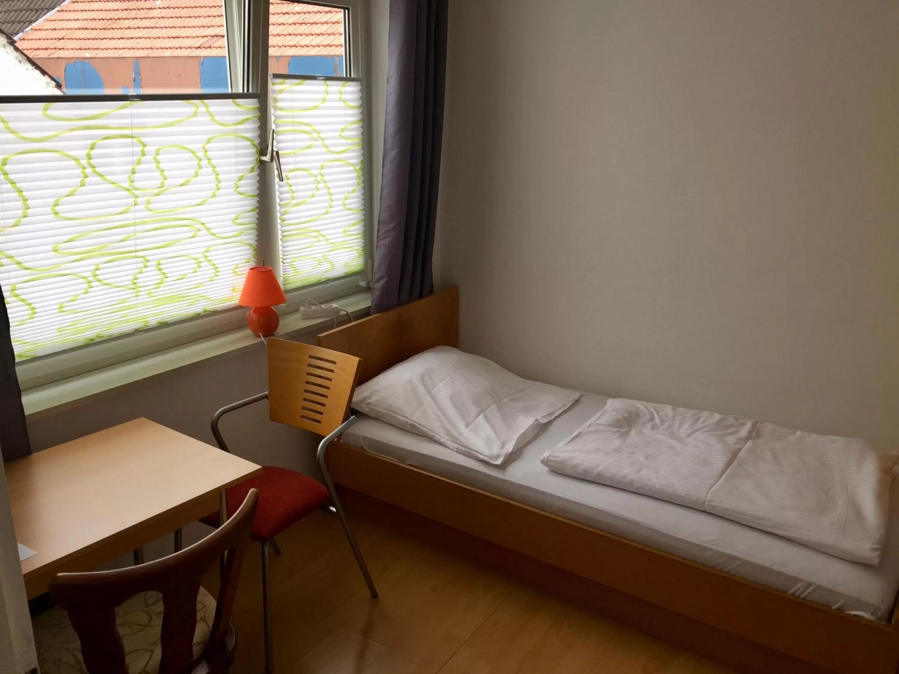 Photo of the whole room, Bed in Hotel Stadt Mainz