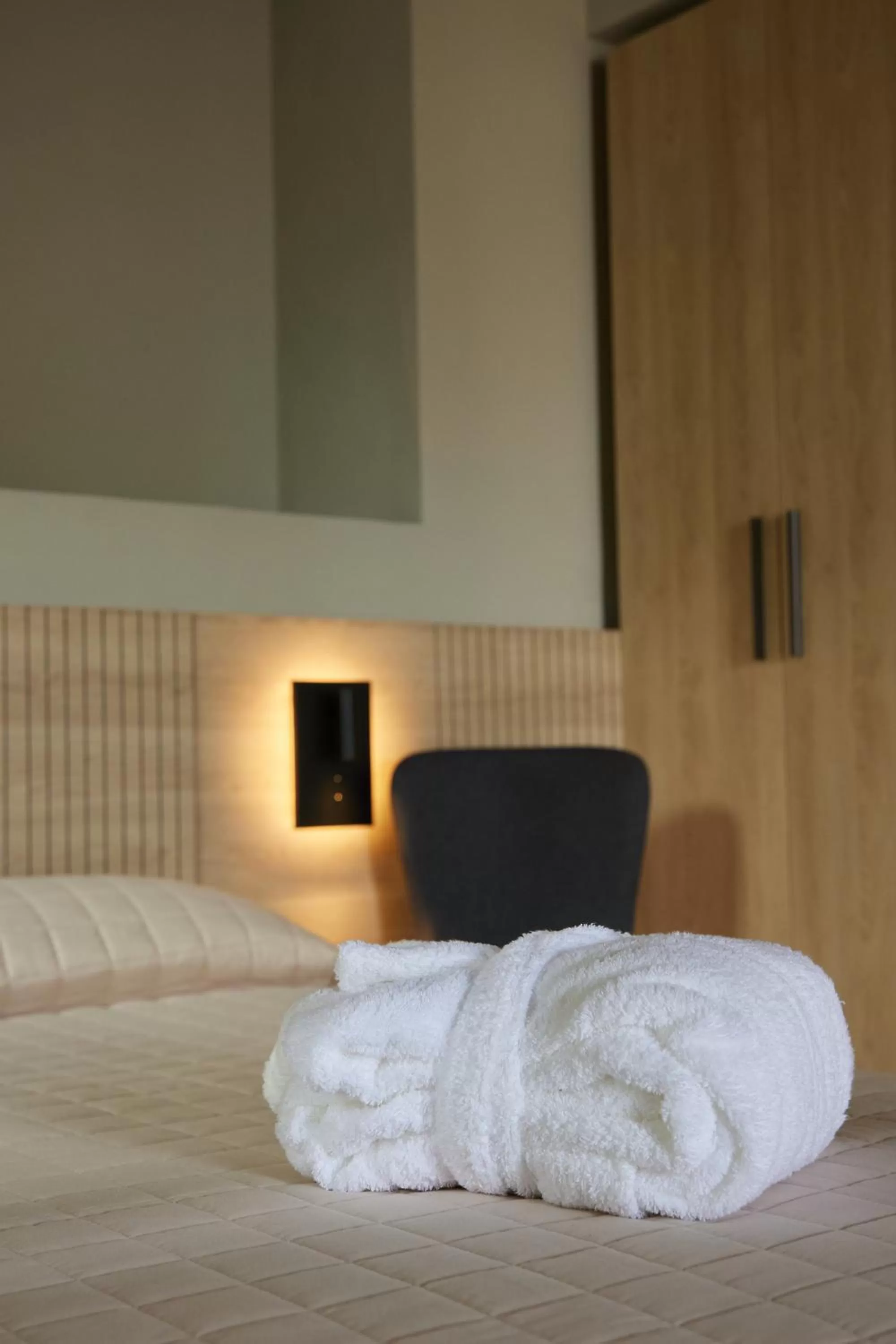 Bed in Mima Aparthotel Boutique & Spa