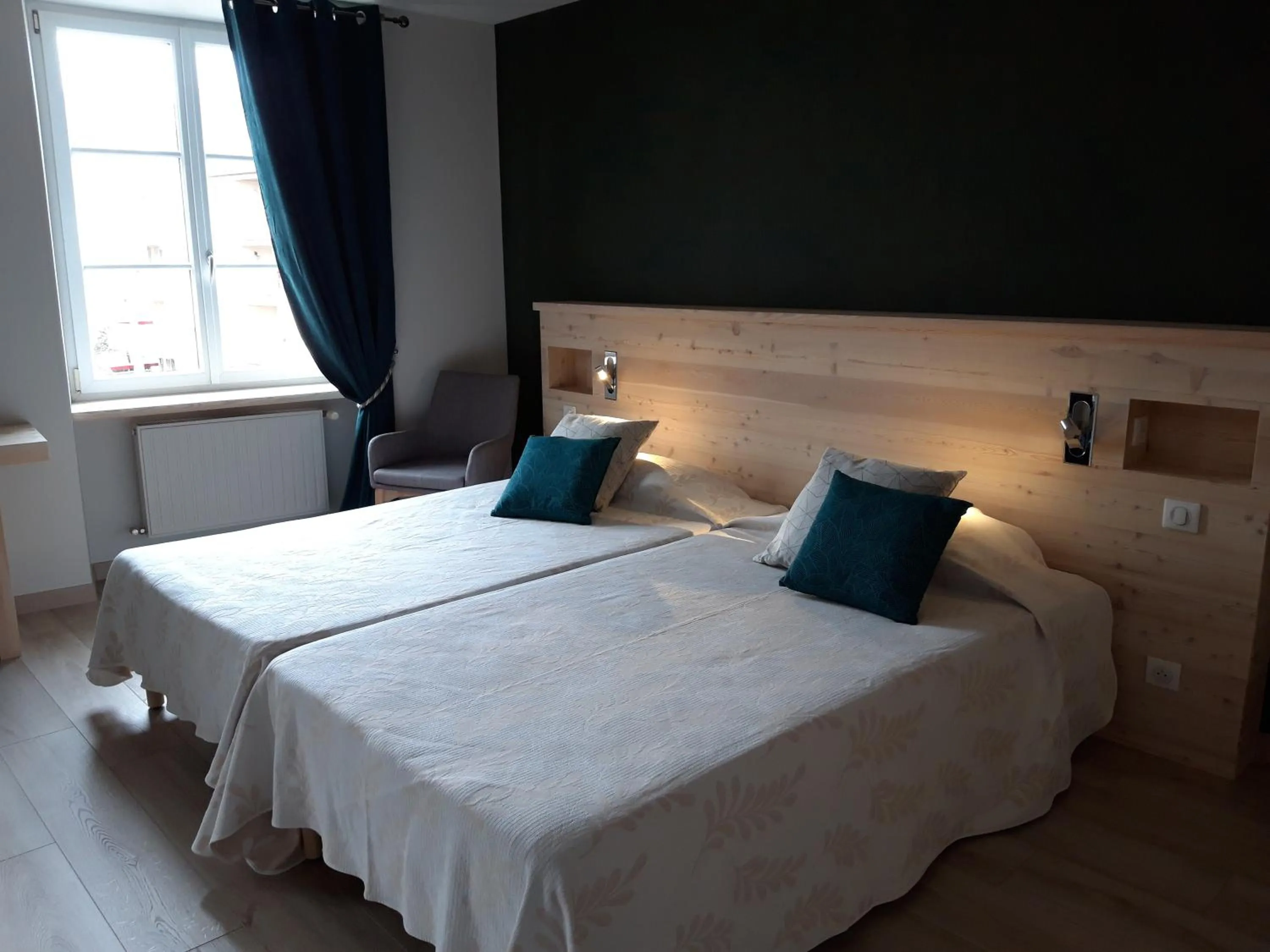 Bed in Hôtel la Guimbarde