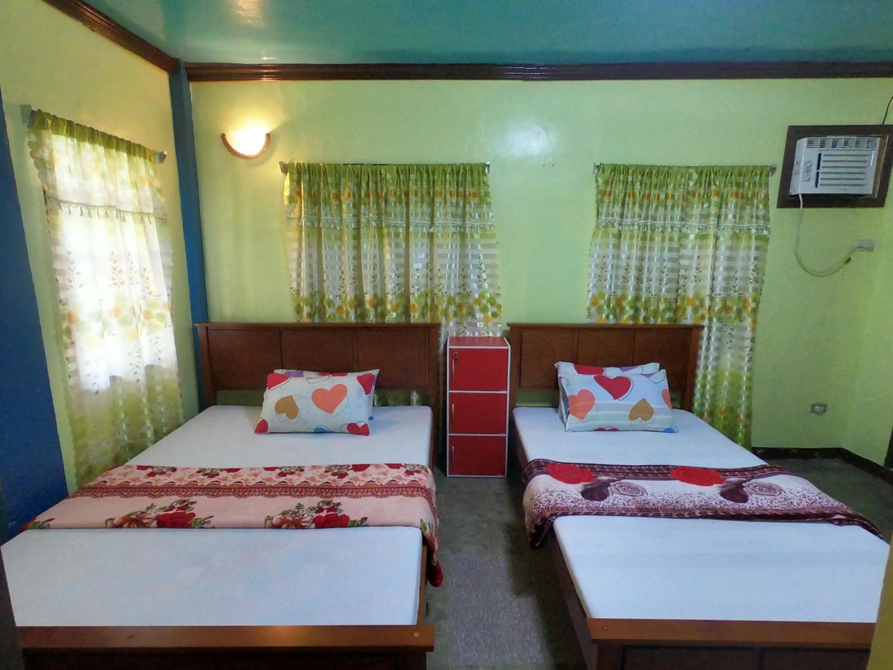 Bed in Bohol Sea Breeze Cottages and Resort