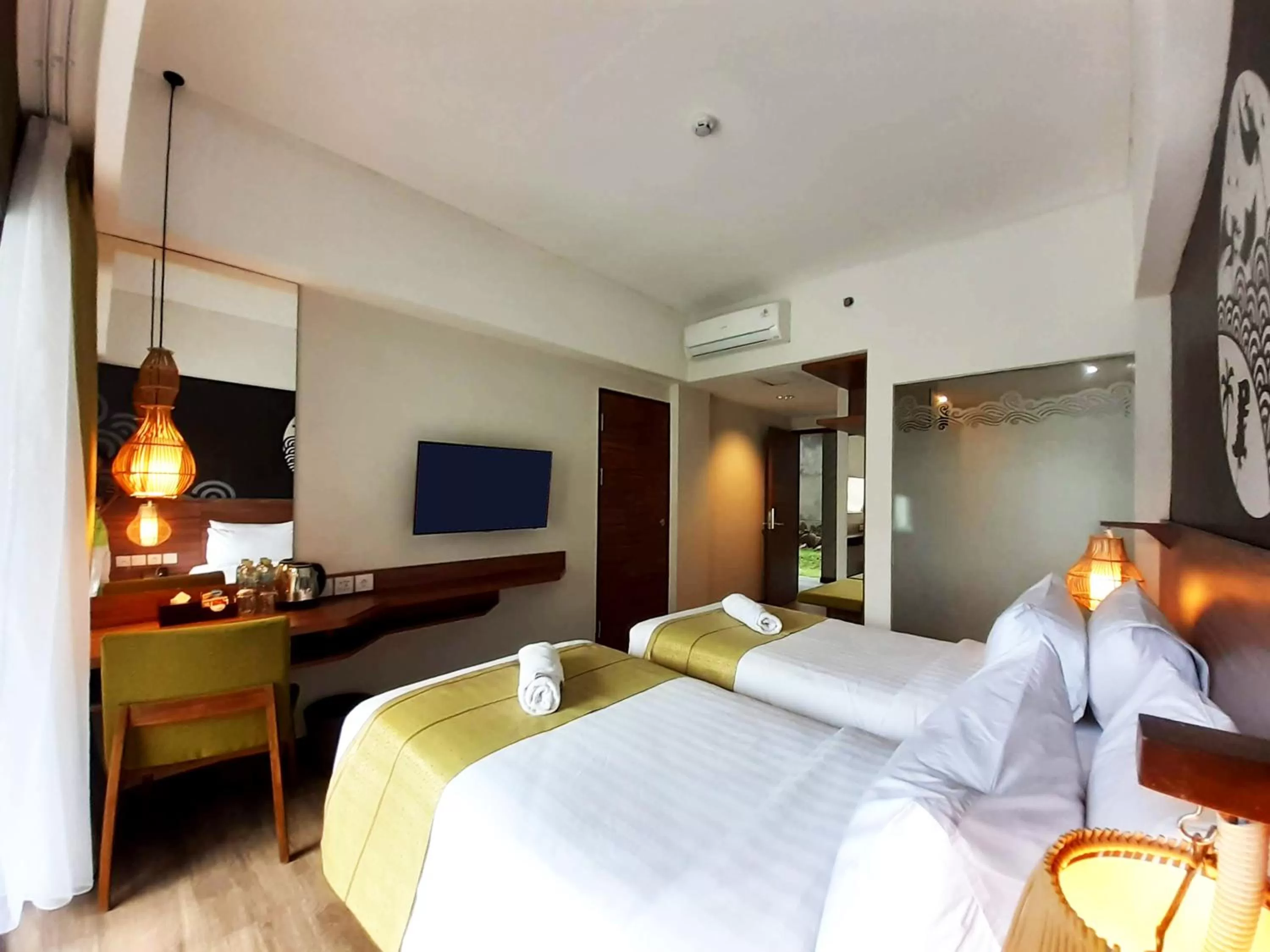 Bed in The Batu Hotel & Villas