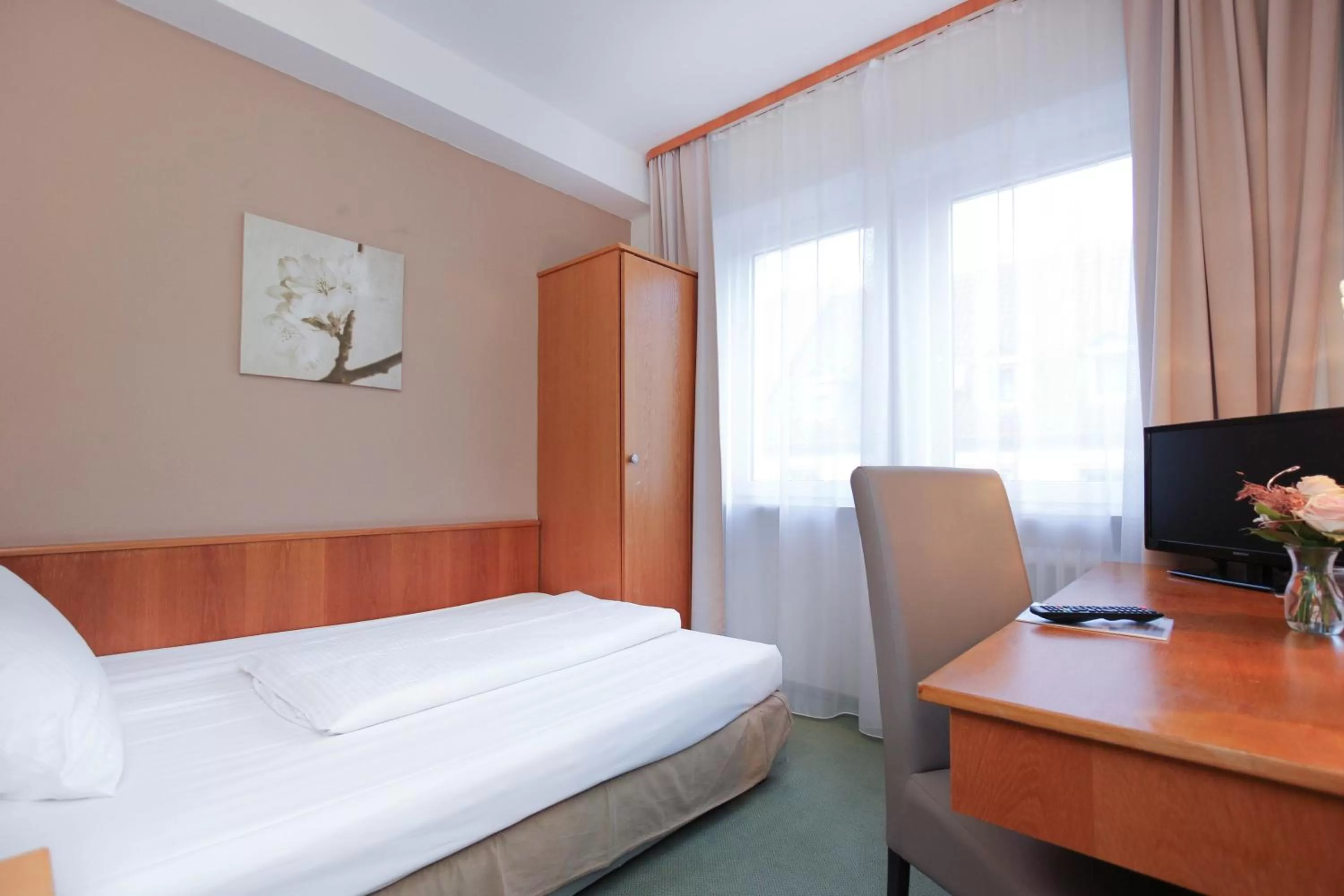 Bed in City Hotel Würzburg