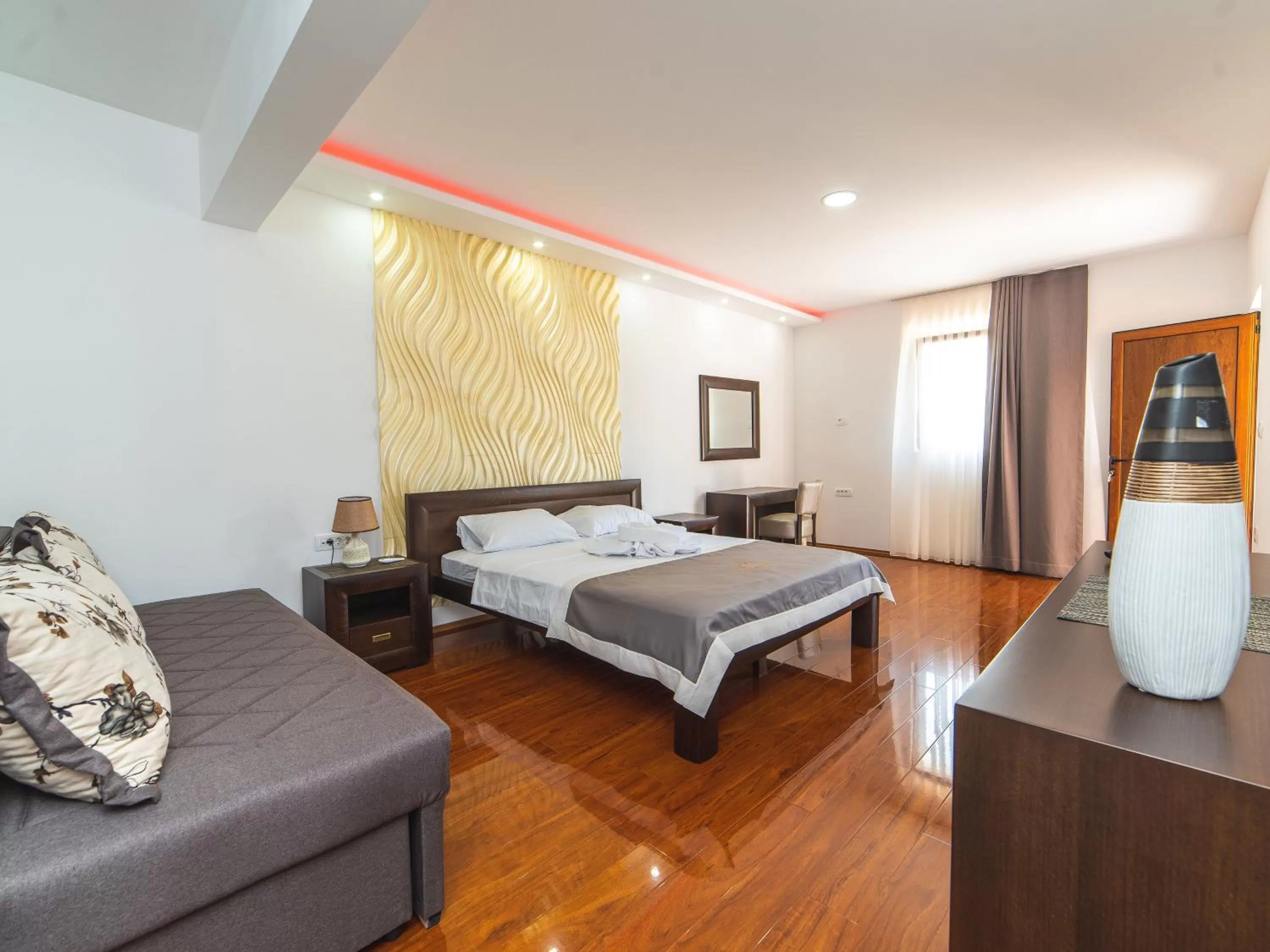 Bed in Hotel Royal Garden