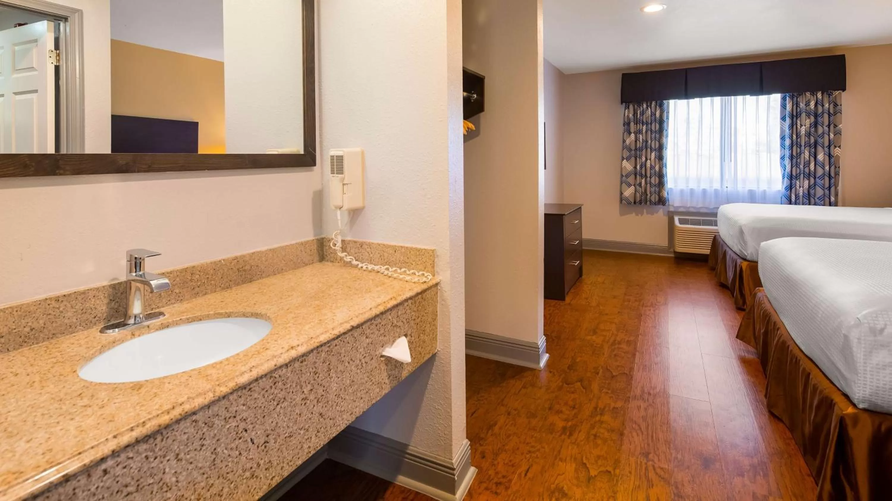 Bathroom, Bed in SureStay Plus Hotel by Best Western Hammond