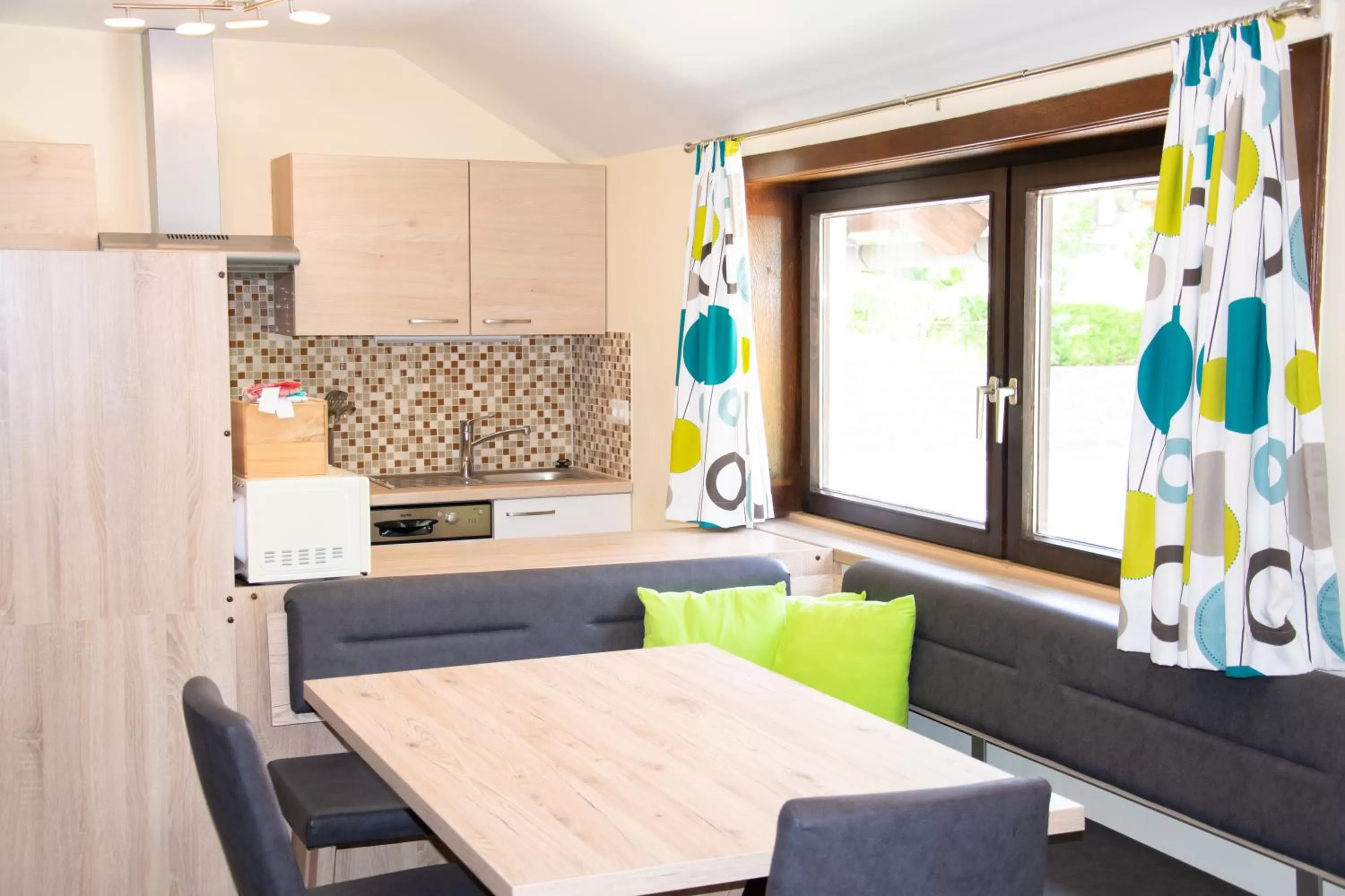 Kitchen or kitchenette in Strandhotel Burgstaller