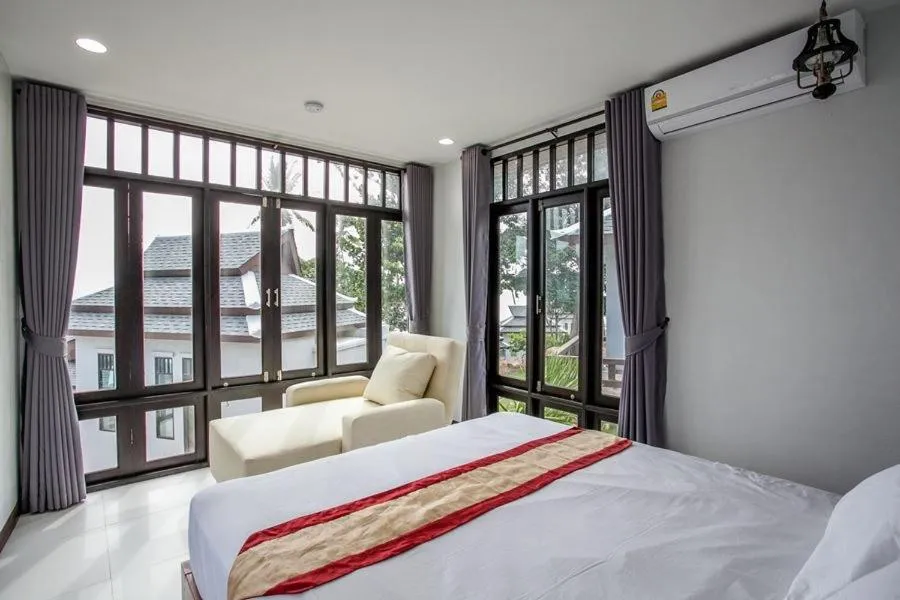 Bed in Lanta Corner Resort