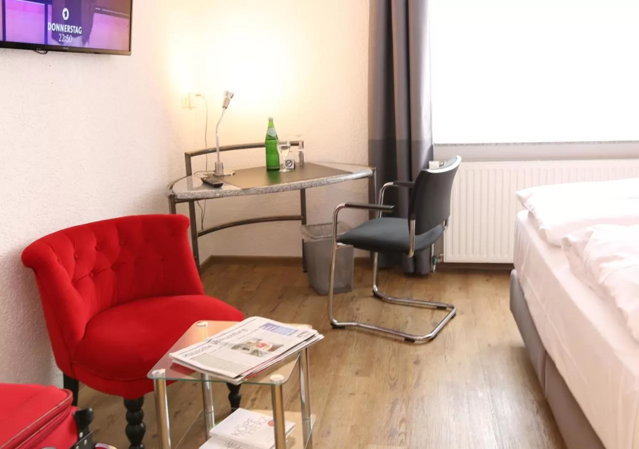 Seating area, Bed in Hotel Rosenhof GmbH