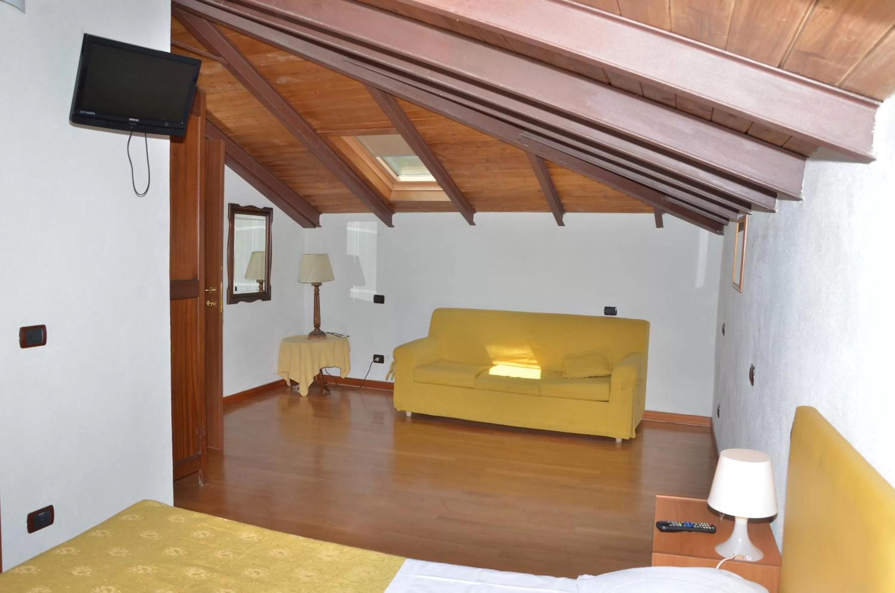 Living room, Bed in Locanda Dal Moccia