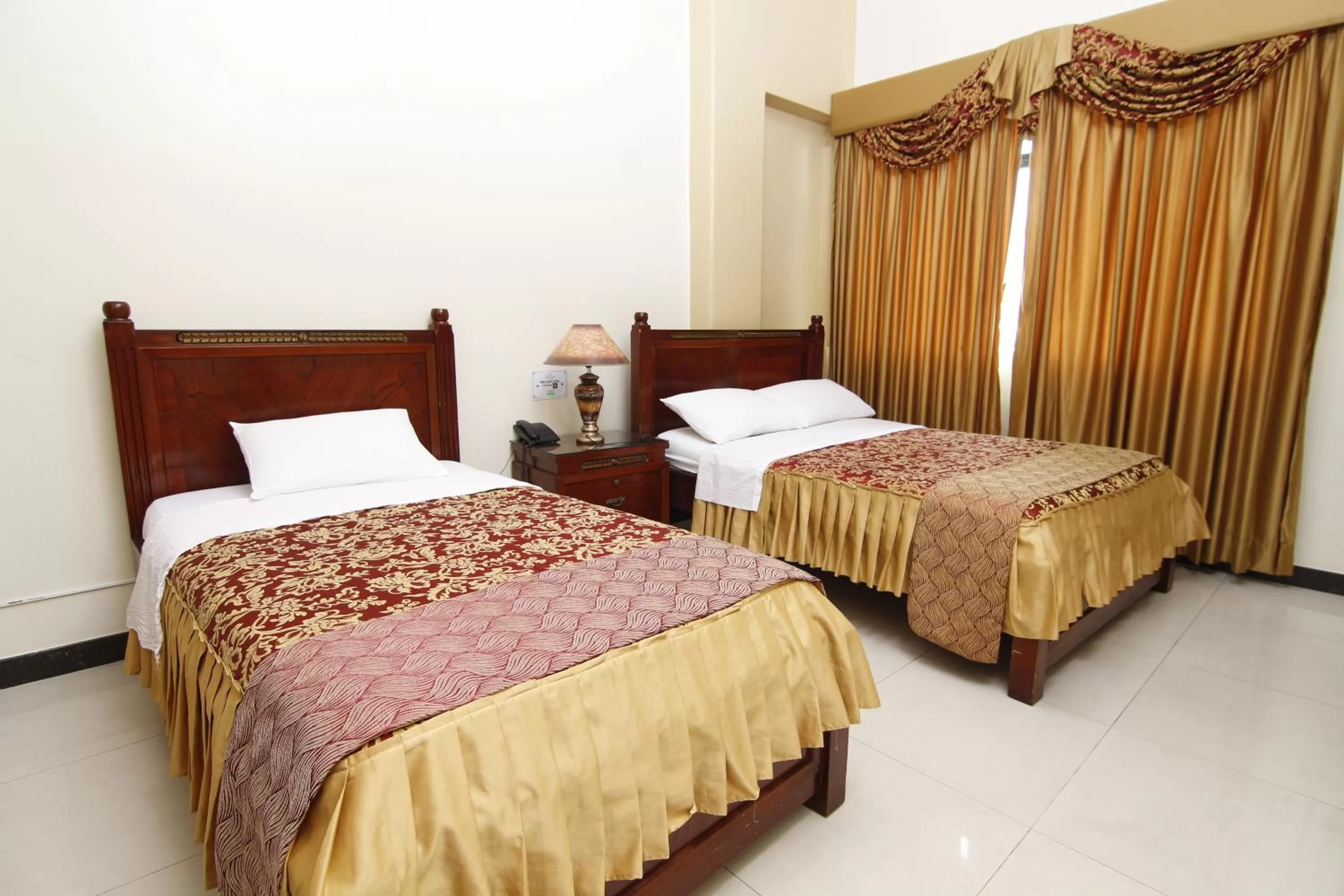 Bed in Hotel Versailles Internacional