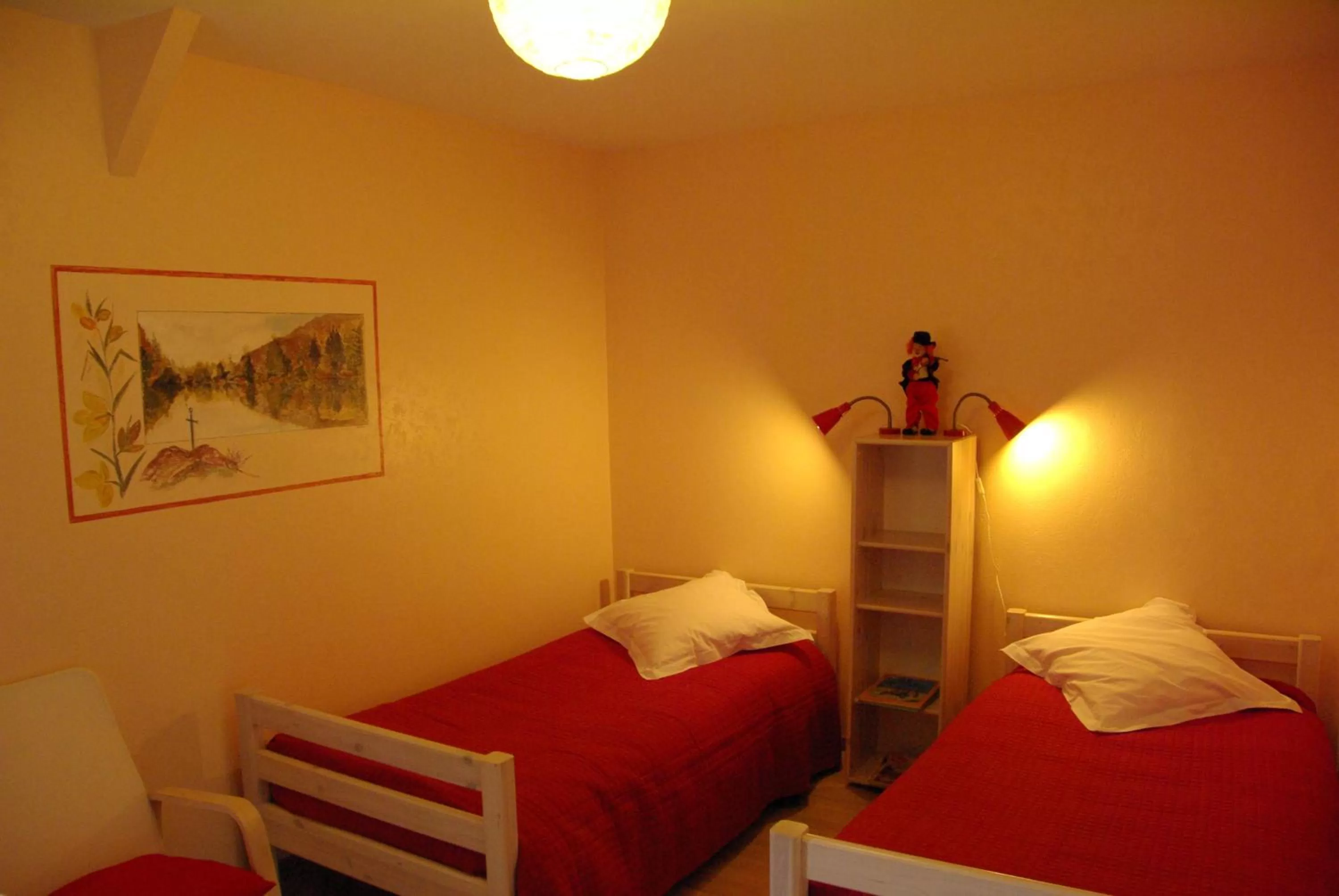 Bed in Chambres d'hôtes La Fontaine Garel