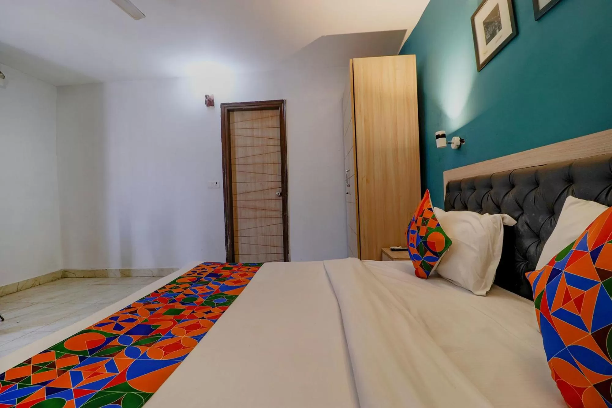 Bed in FabHotel Happy Inn