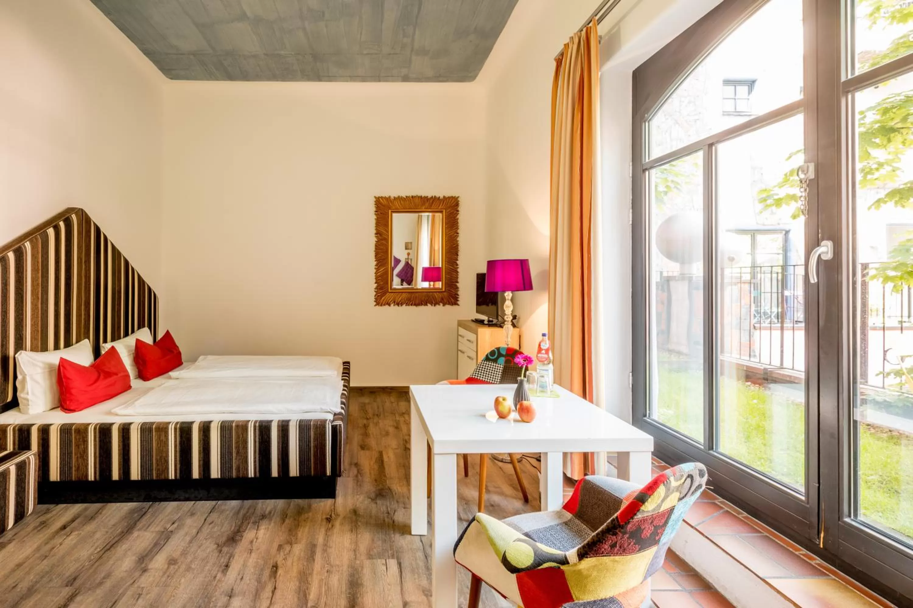 Photo of the whole room, Bed in artHOTEL Magdeburg