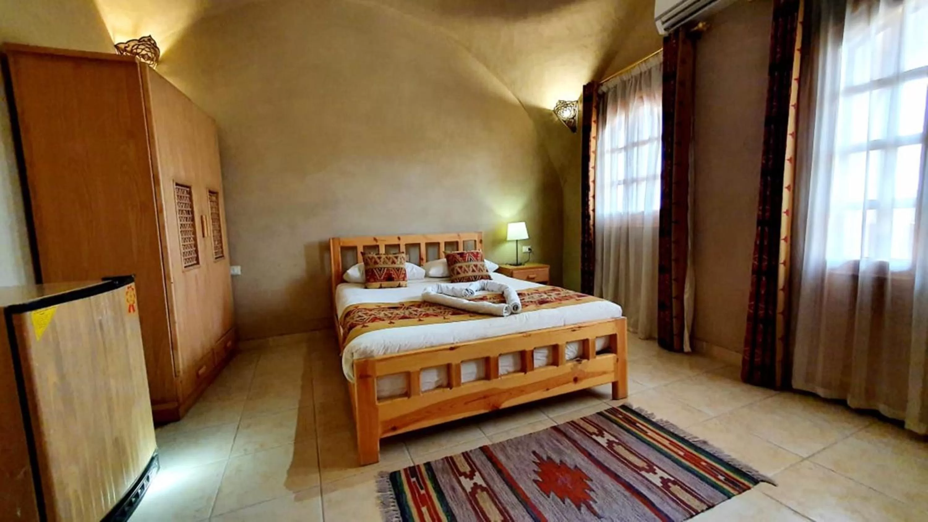 Bed in Embrace Hotel