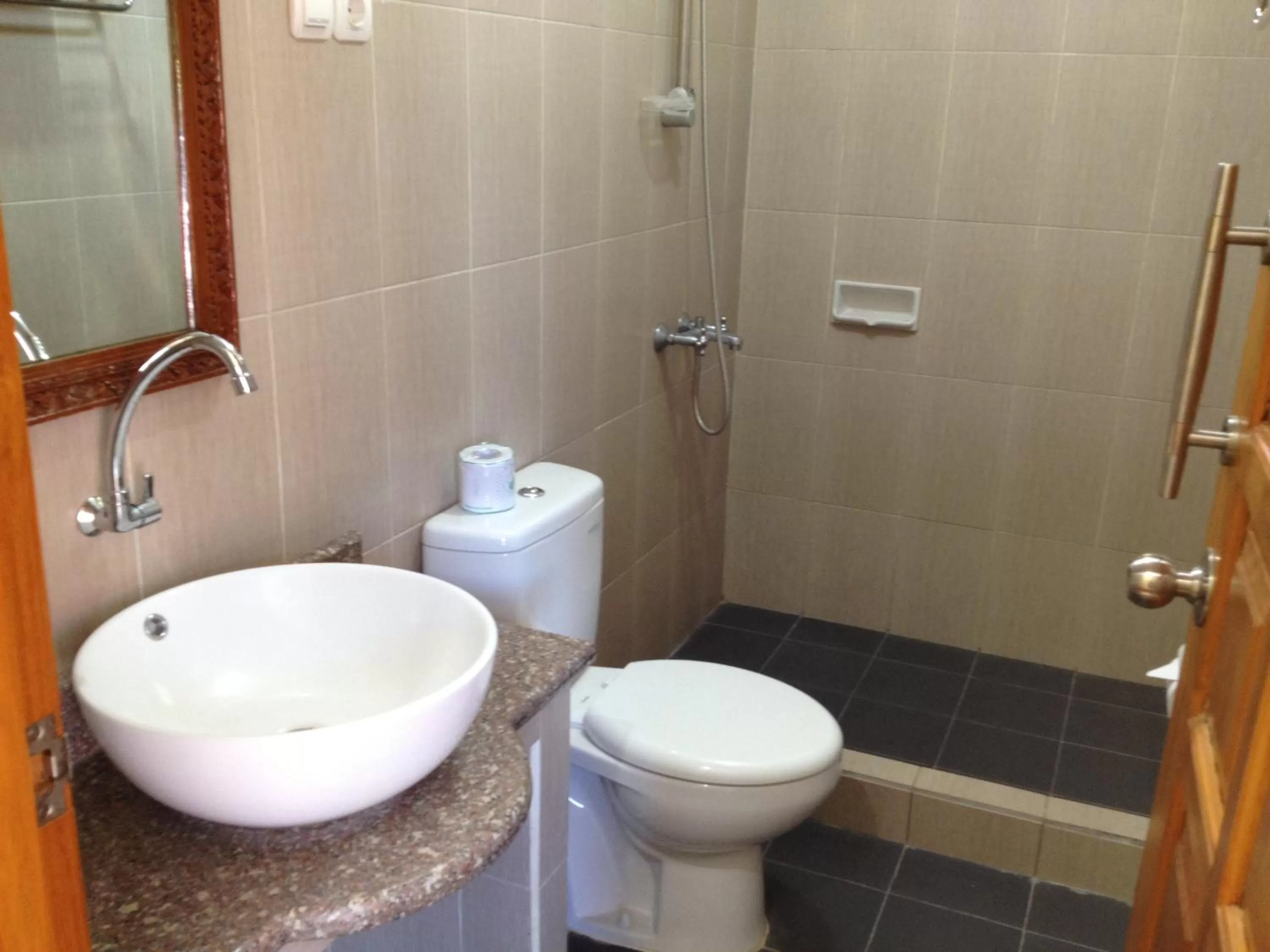 Bathroom in Astina Hotel