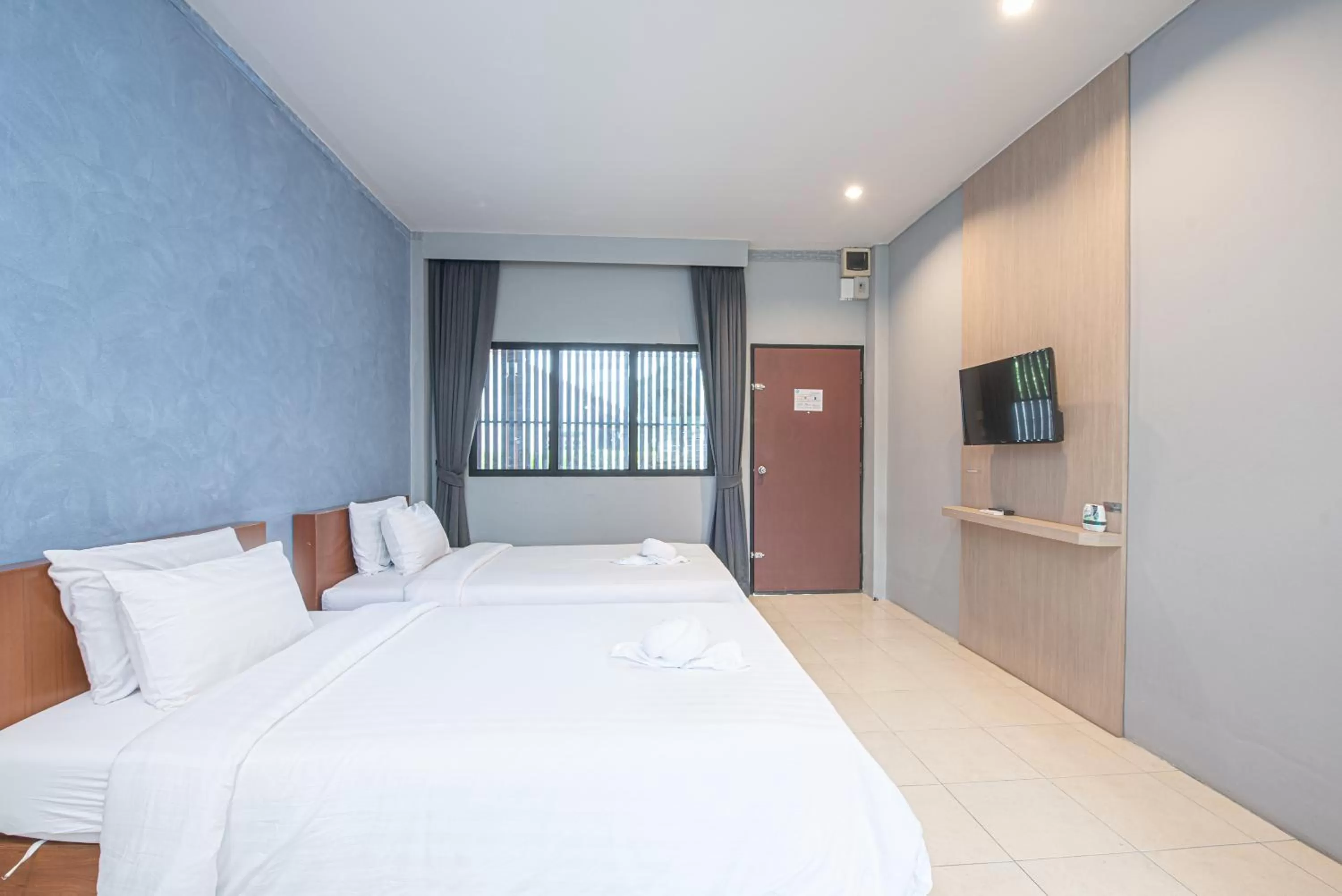 Photo of the whole room, Bed in Tarnsiri Boutique Resort