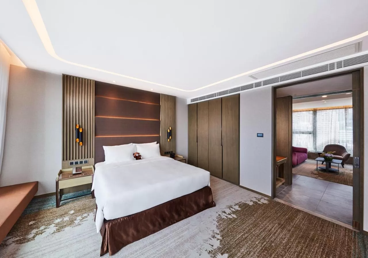 Living room, Bed in Oasis Aurum 181 Hotel