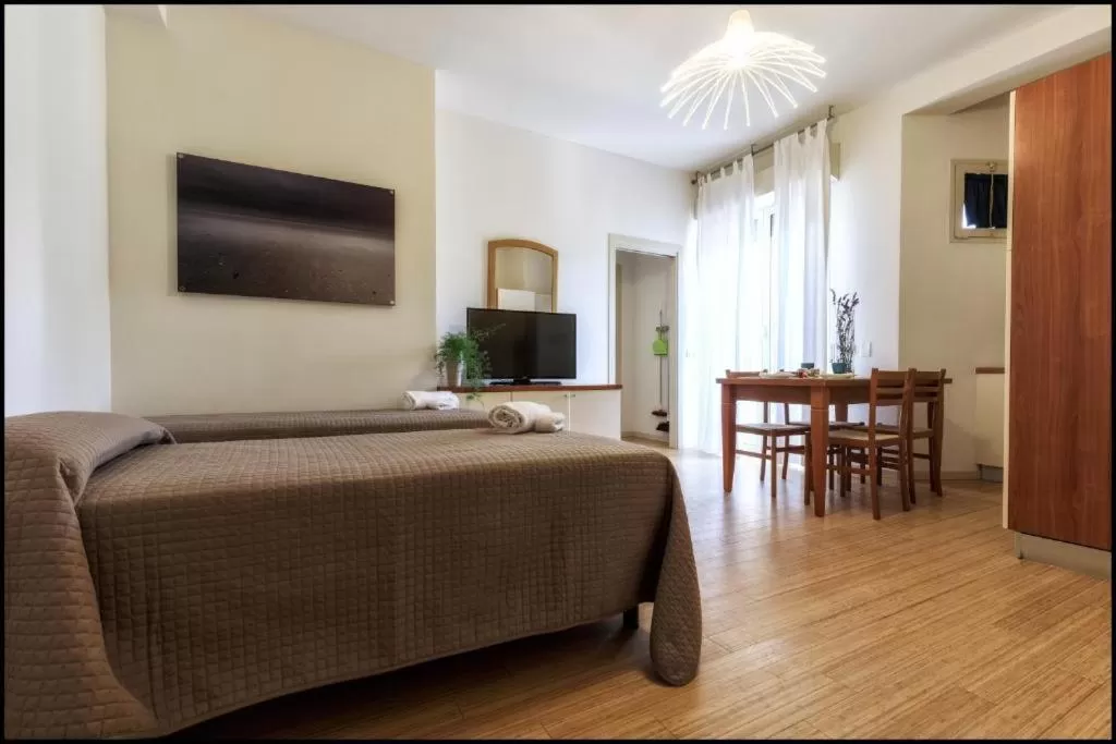 Living room, Bed in Residence Rivaverde