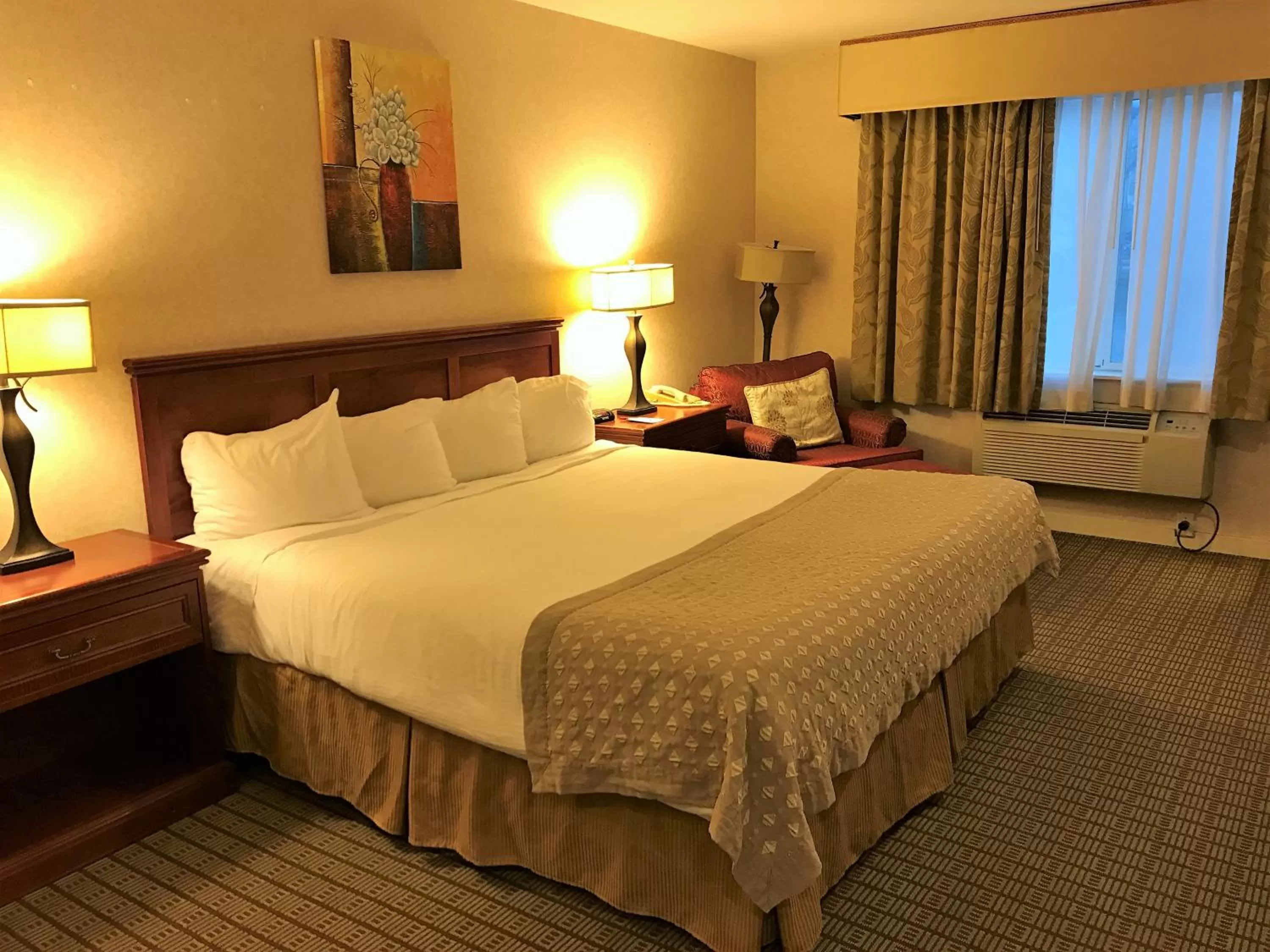 Photo of the whole room, Bed in Ramada by Wyndham Draper, Utah