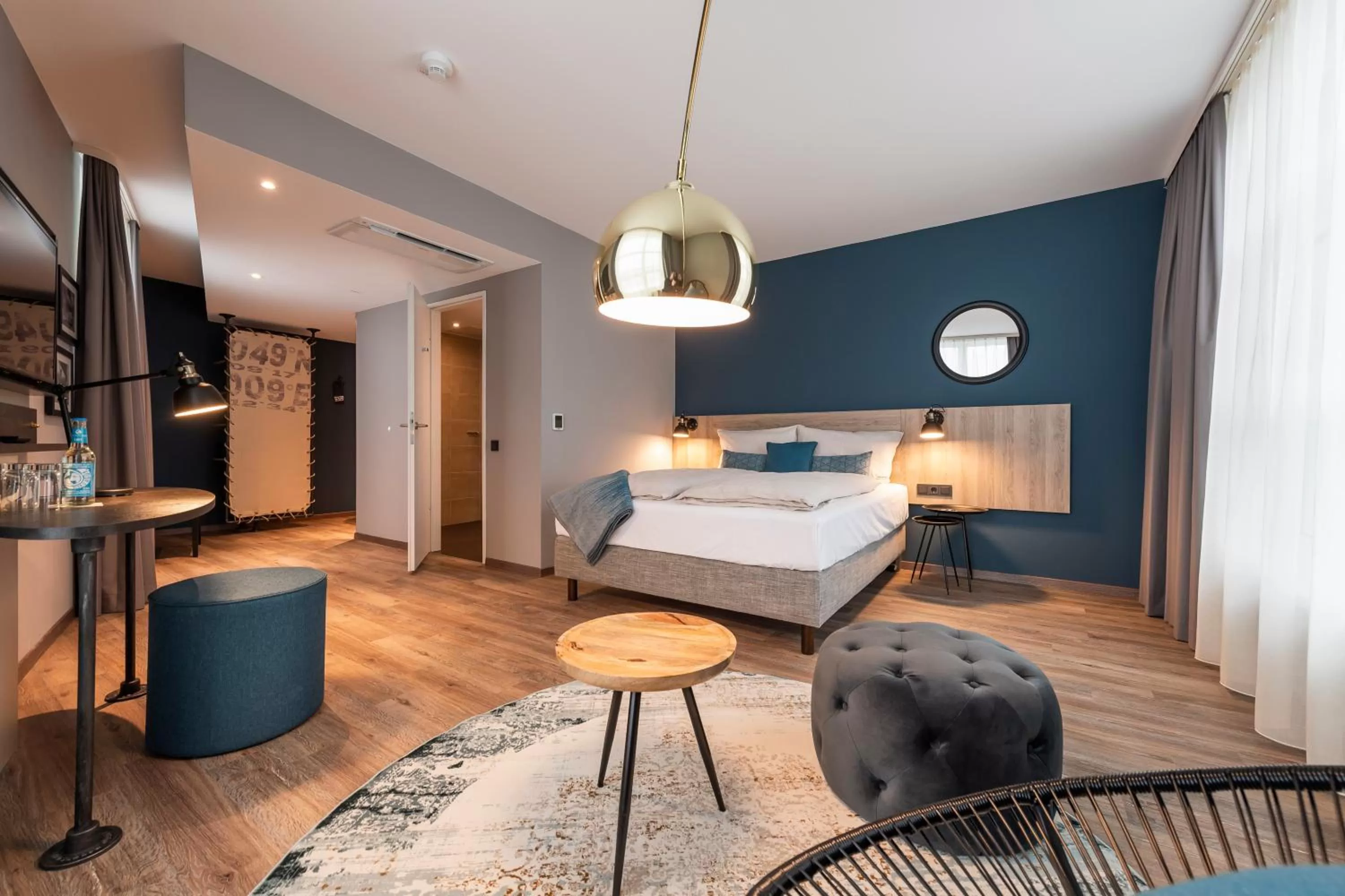 Photo of the whole room, Bed in HARBR. hotel Heilbronn