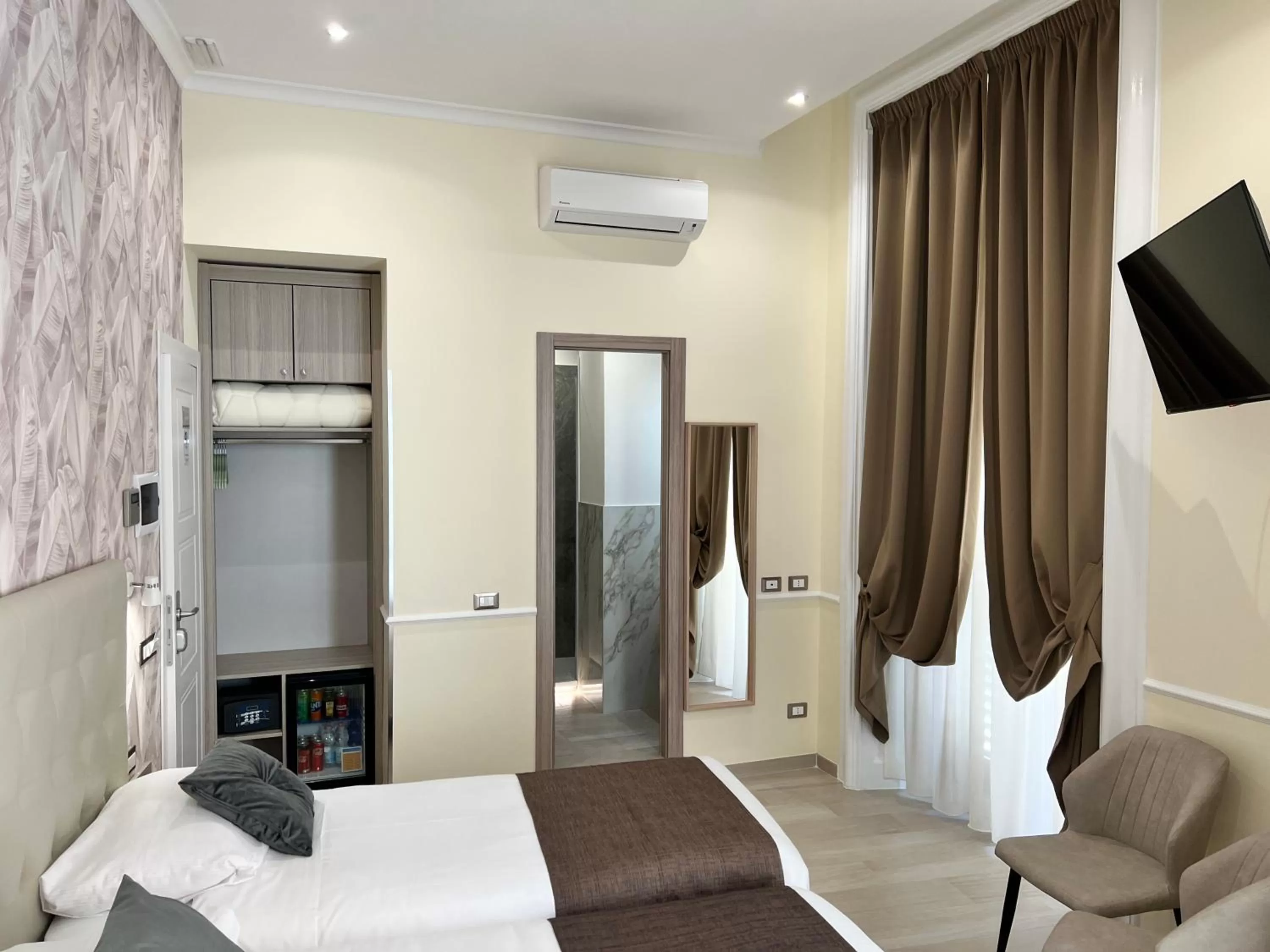 Bed in Hotel Le Petit