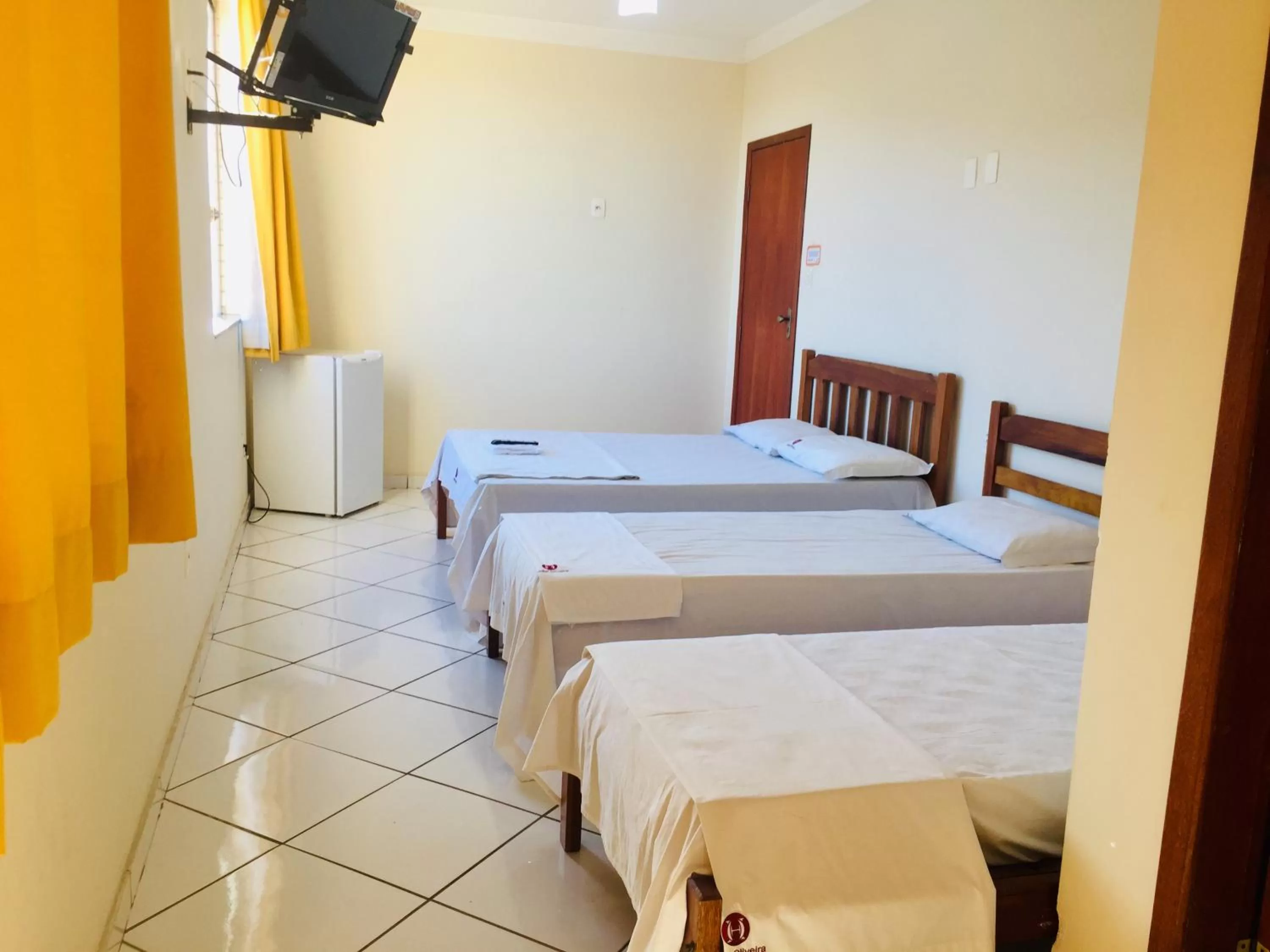 Bed in Hotel Oliveira