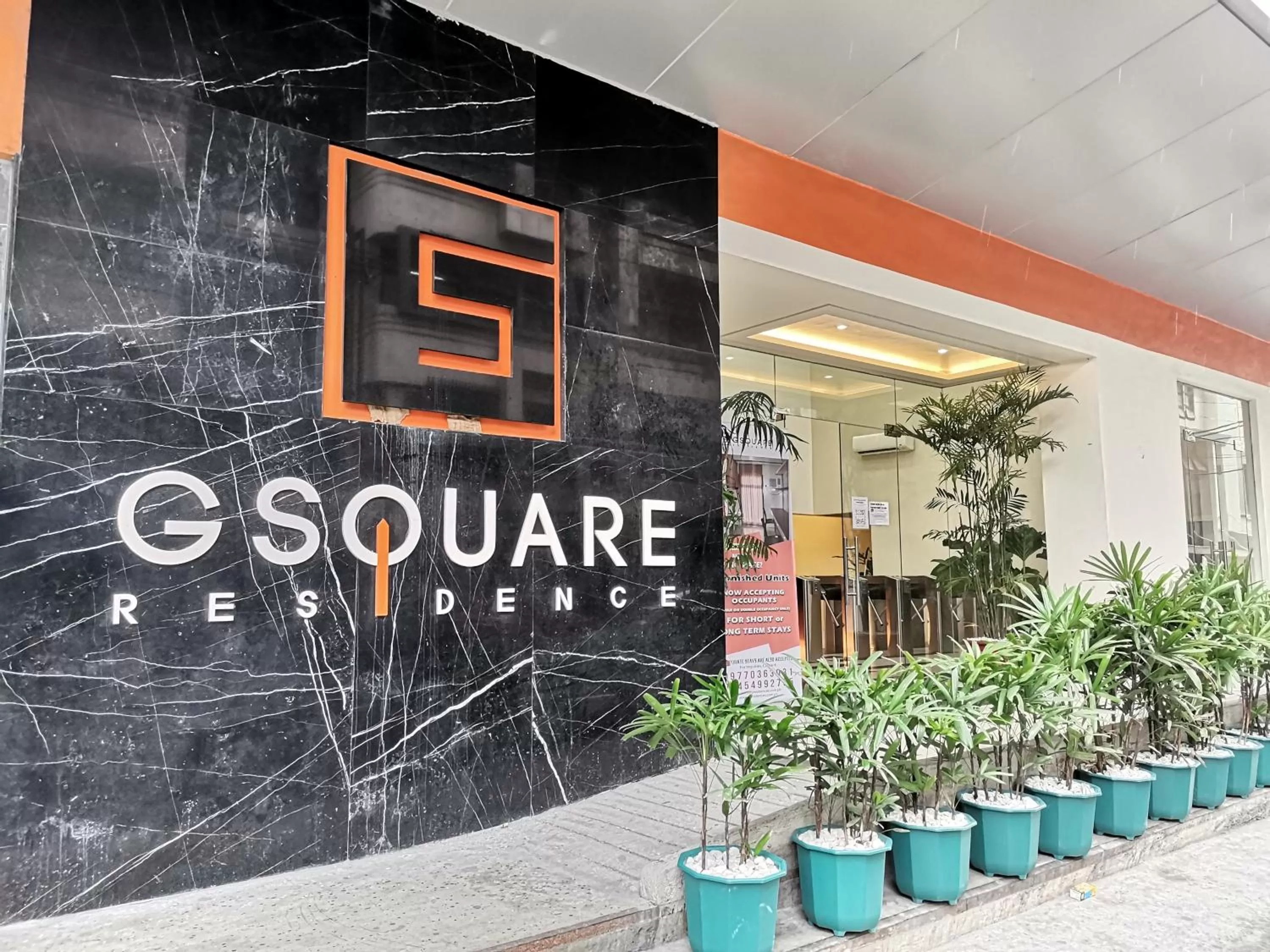 Property logo or sign in G Square Residences