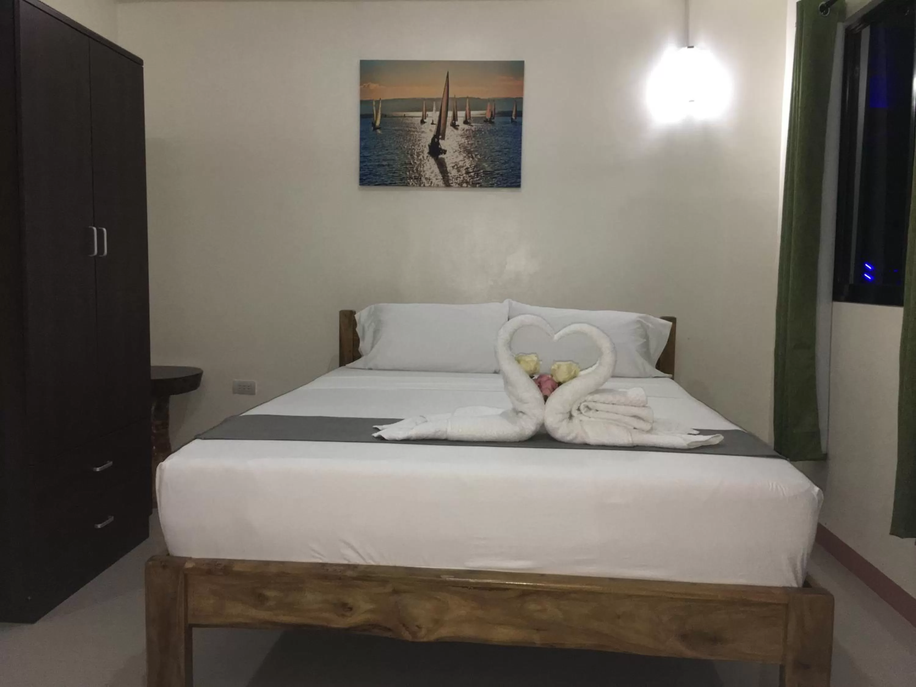 Bed in Aloha Seaside Resort