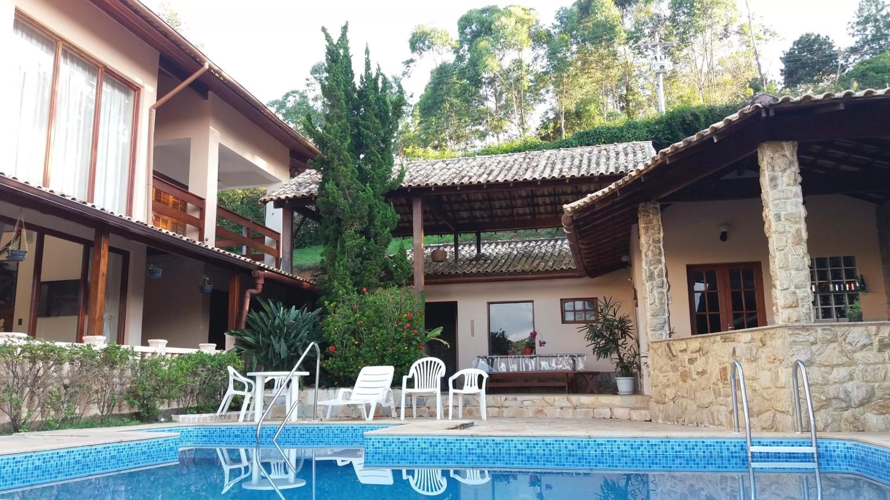 Pool view in Pousada R.N.C. Nosso Paraíso