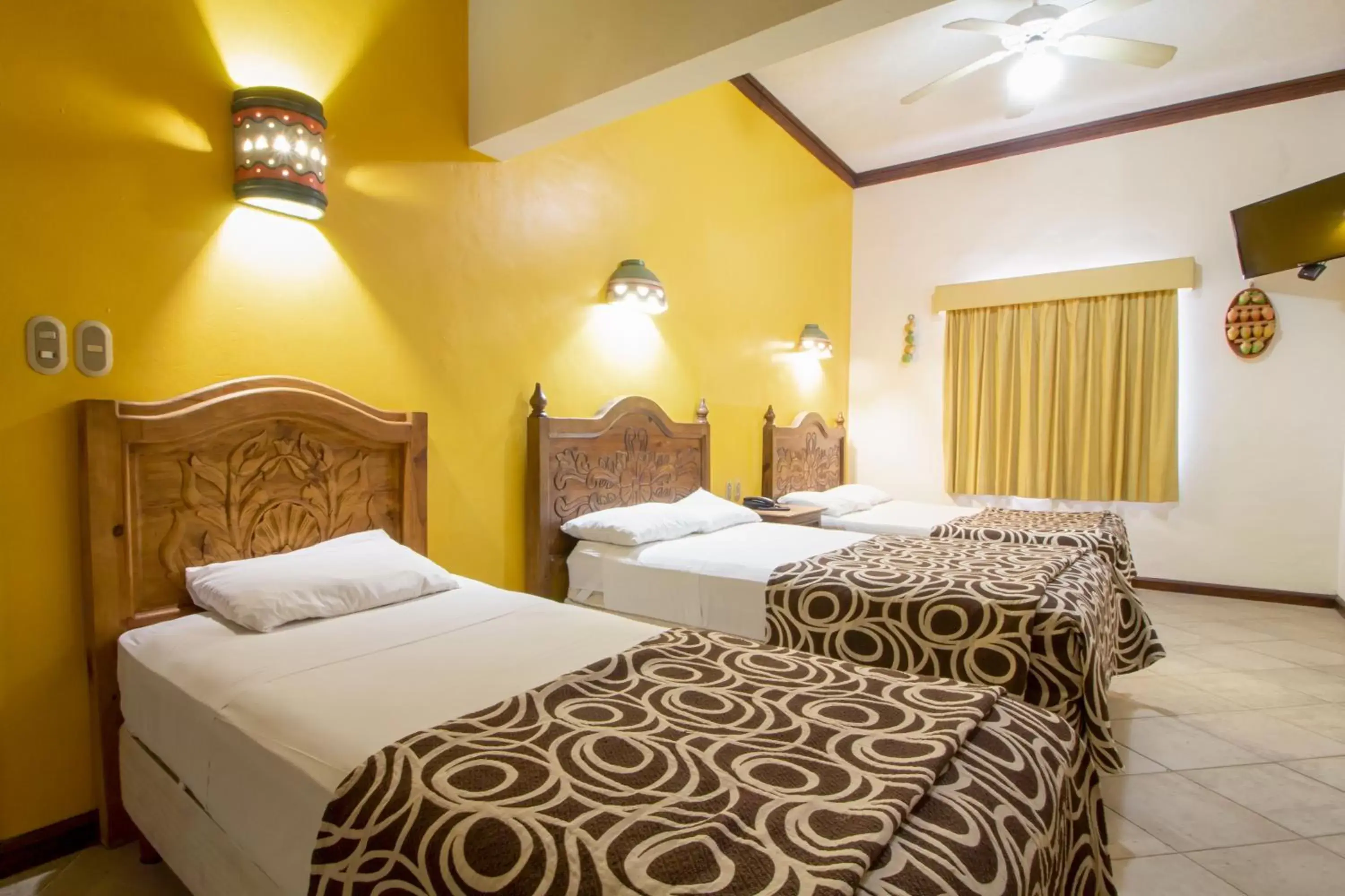 Triple Room in Suites Flamboyanes Triple Room in Suites Flamboyanes