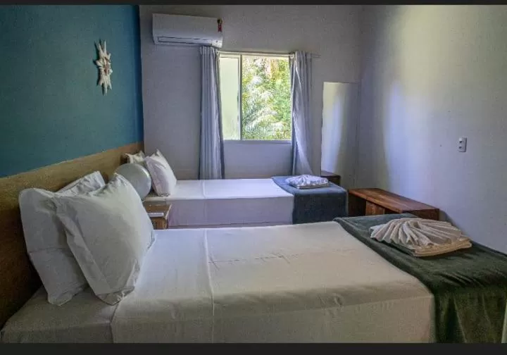 Bed in Angá Beach Hotel