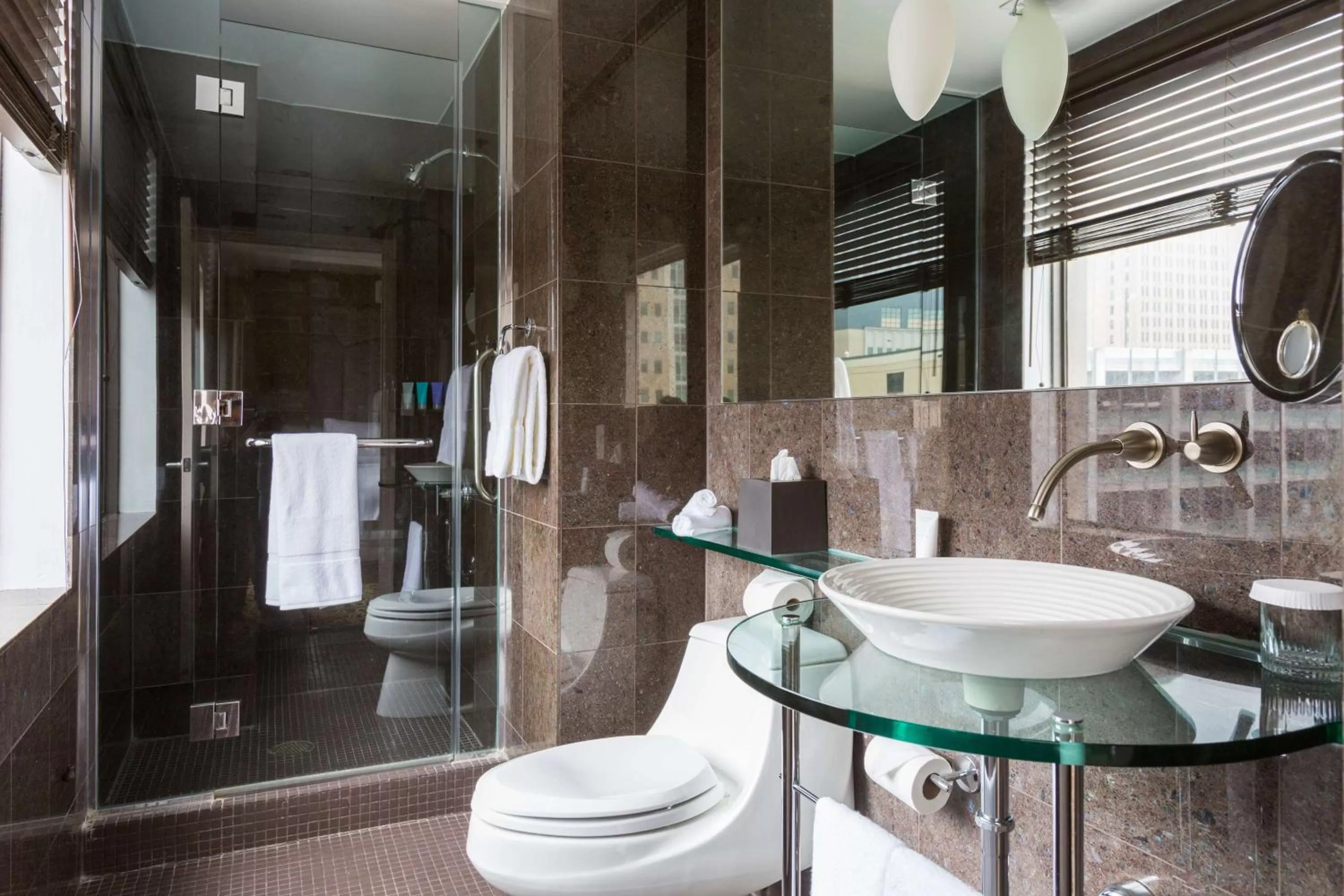 Shower in The Sam Houston Hotel, Curio Collection by Hilton