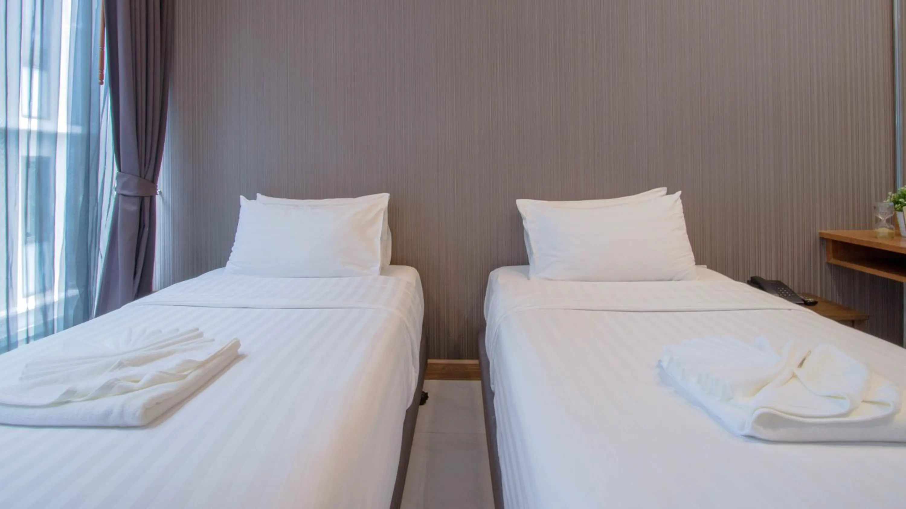 Bed in Kepler Residence Bangkok