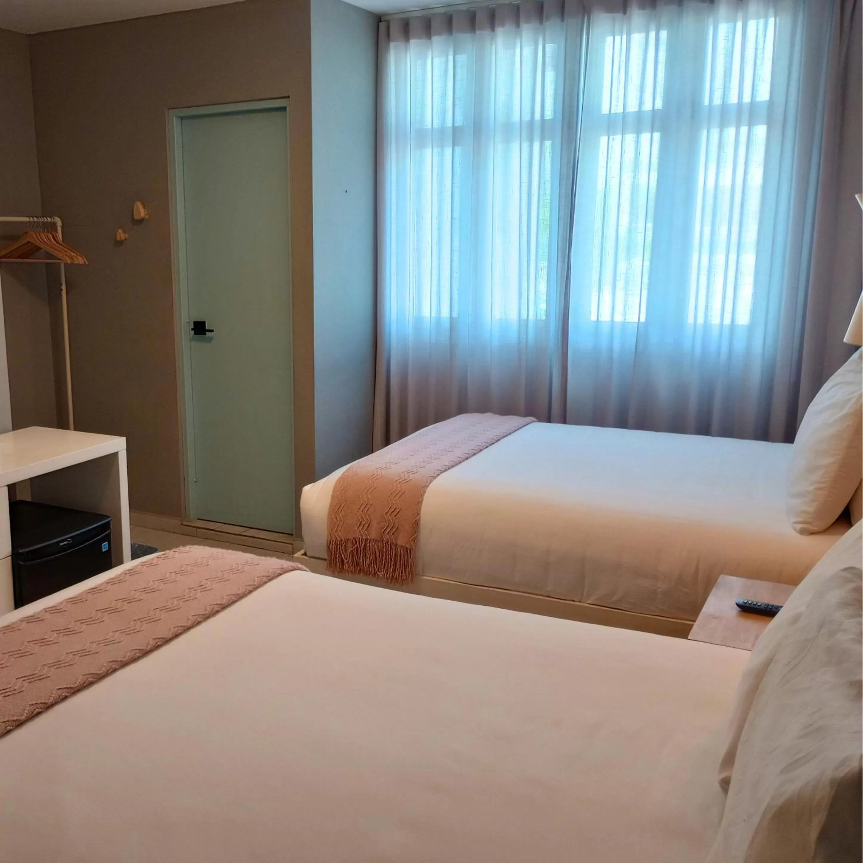 Bed in Trópica Beach Hotel