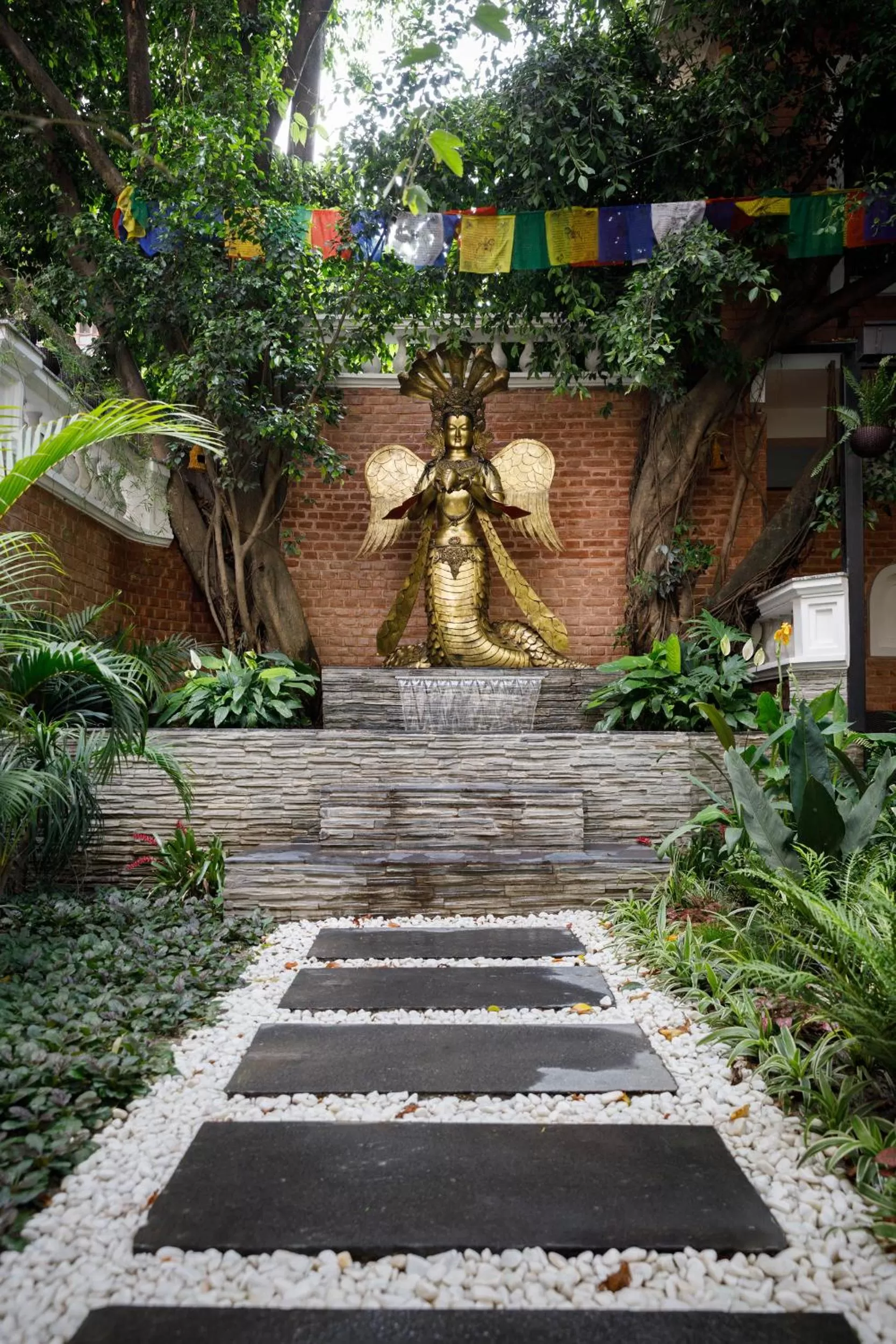 Garden in Hotel Thrive, A Tropical Courtyard