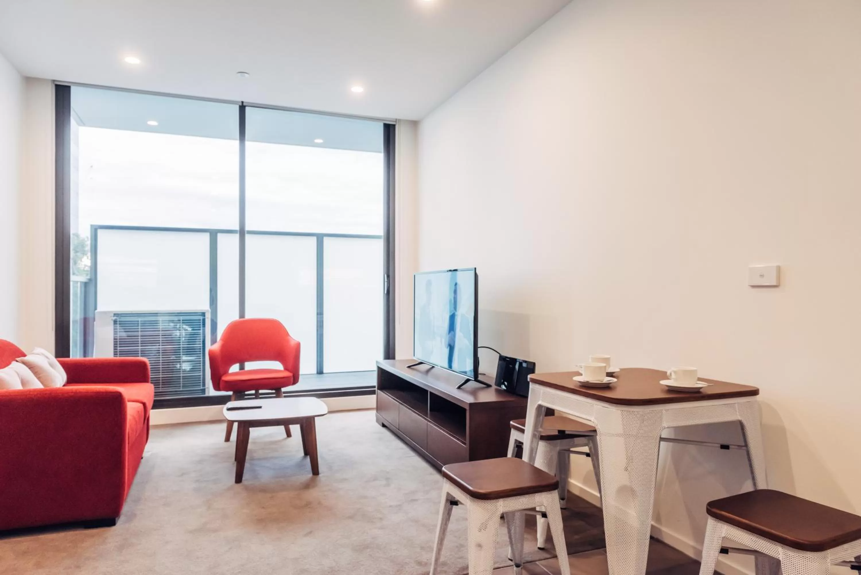 Living room in Comfort Apartments Box Hill