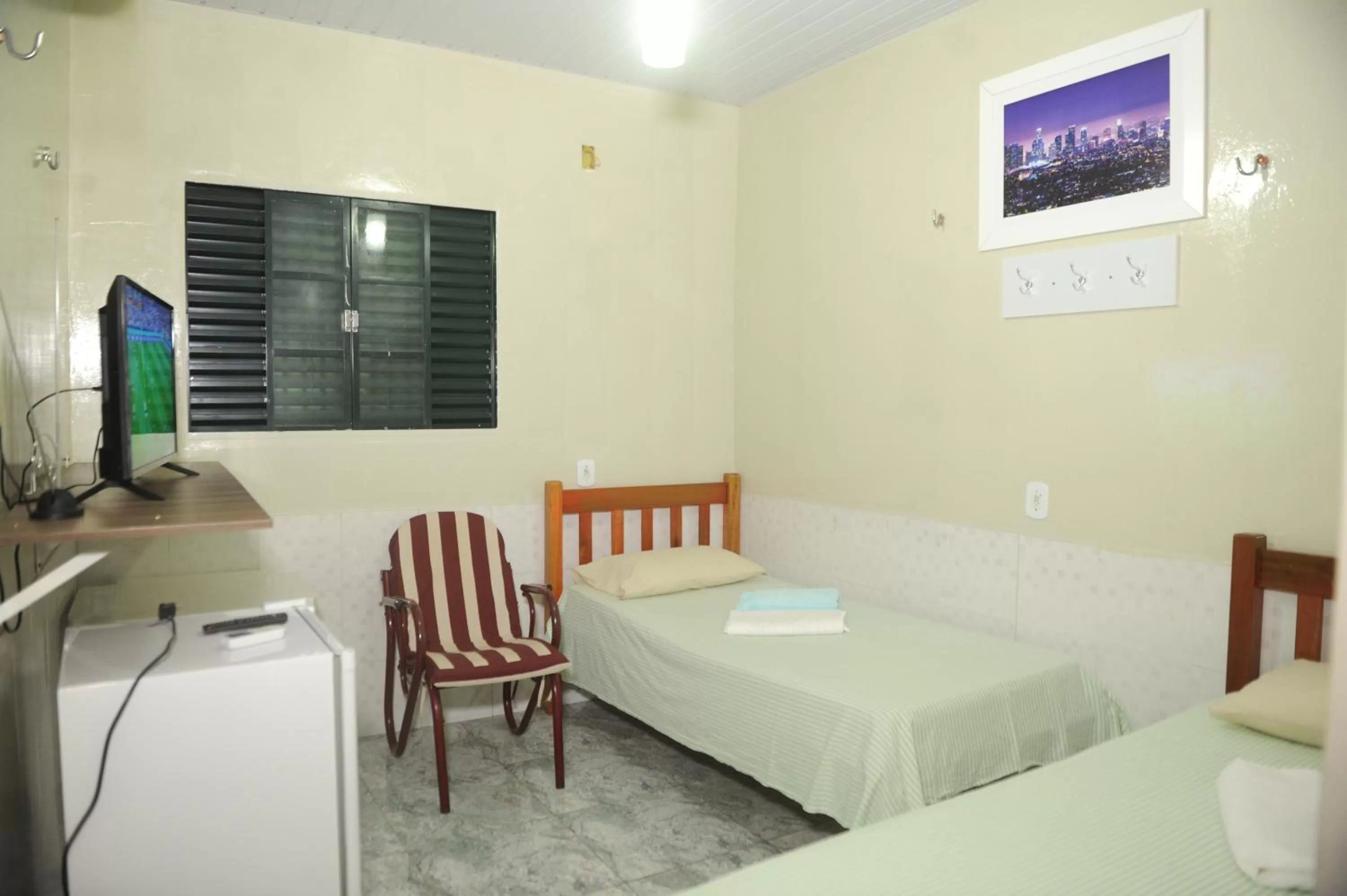 Bed in Hotel Bem Vindo