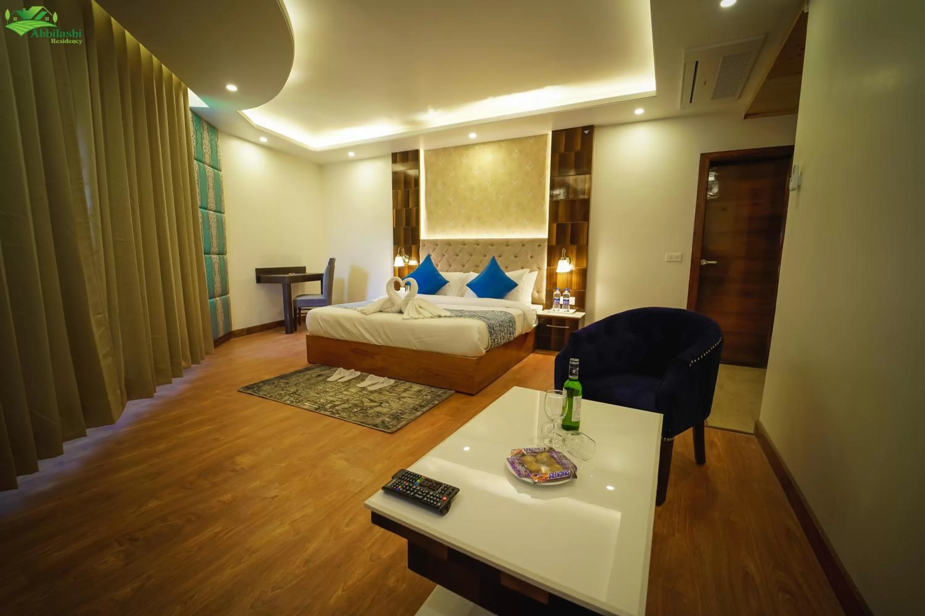 Living room, Bed in Abhilashi Residency & Spa - Centrally Heated & Air Cooled