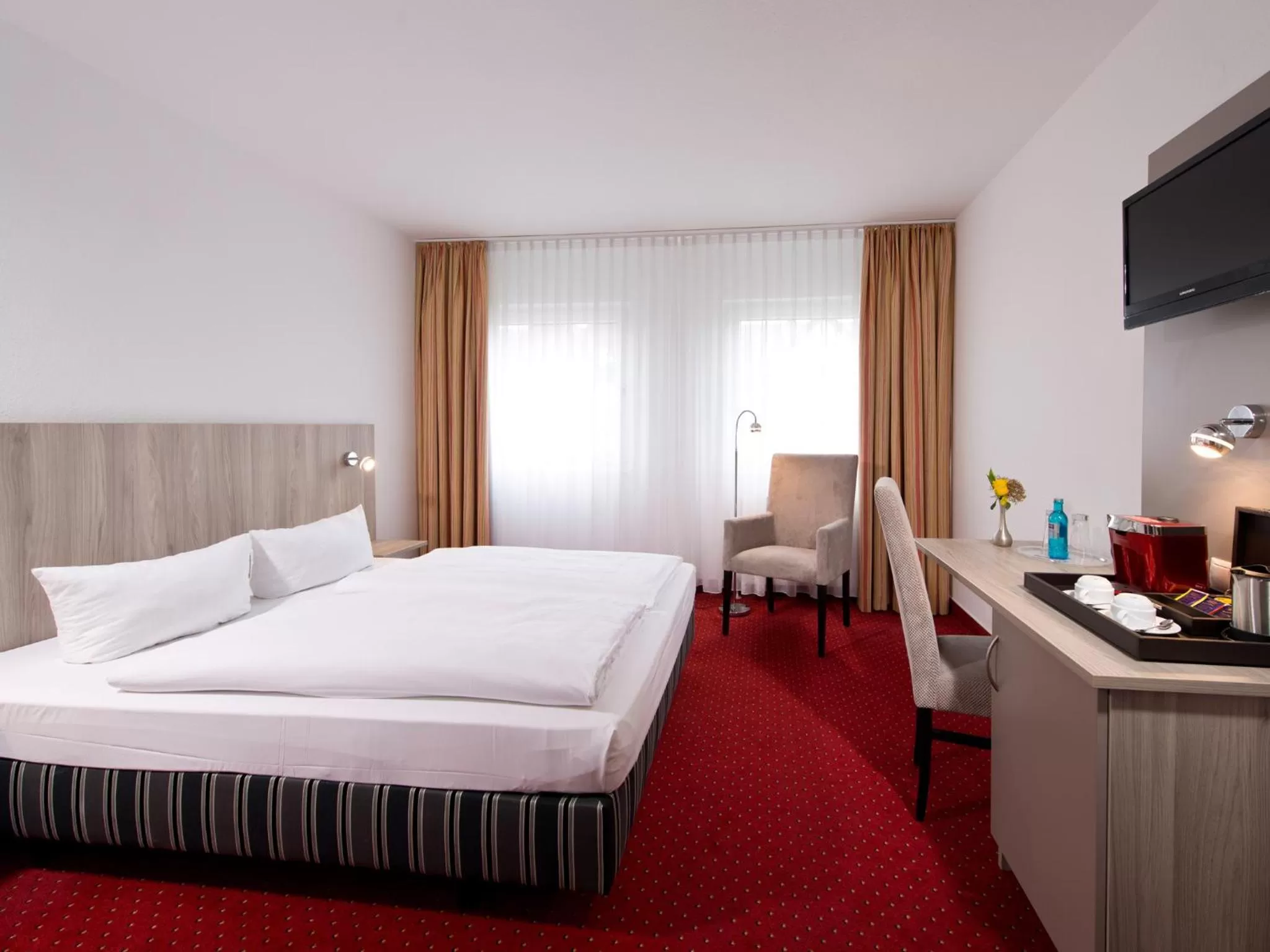 Photo of the whole room, Bed in ACHAT Hotel Frankenthal in der Pfalz
