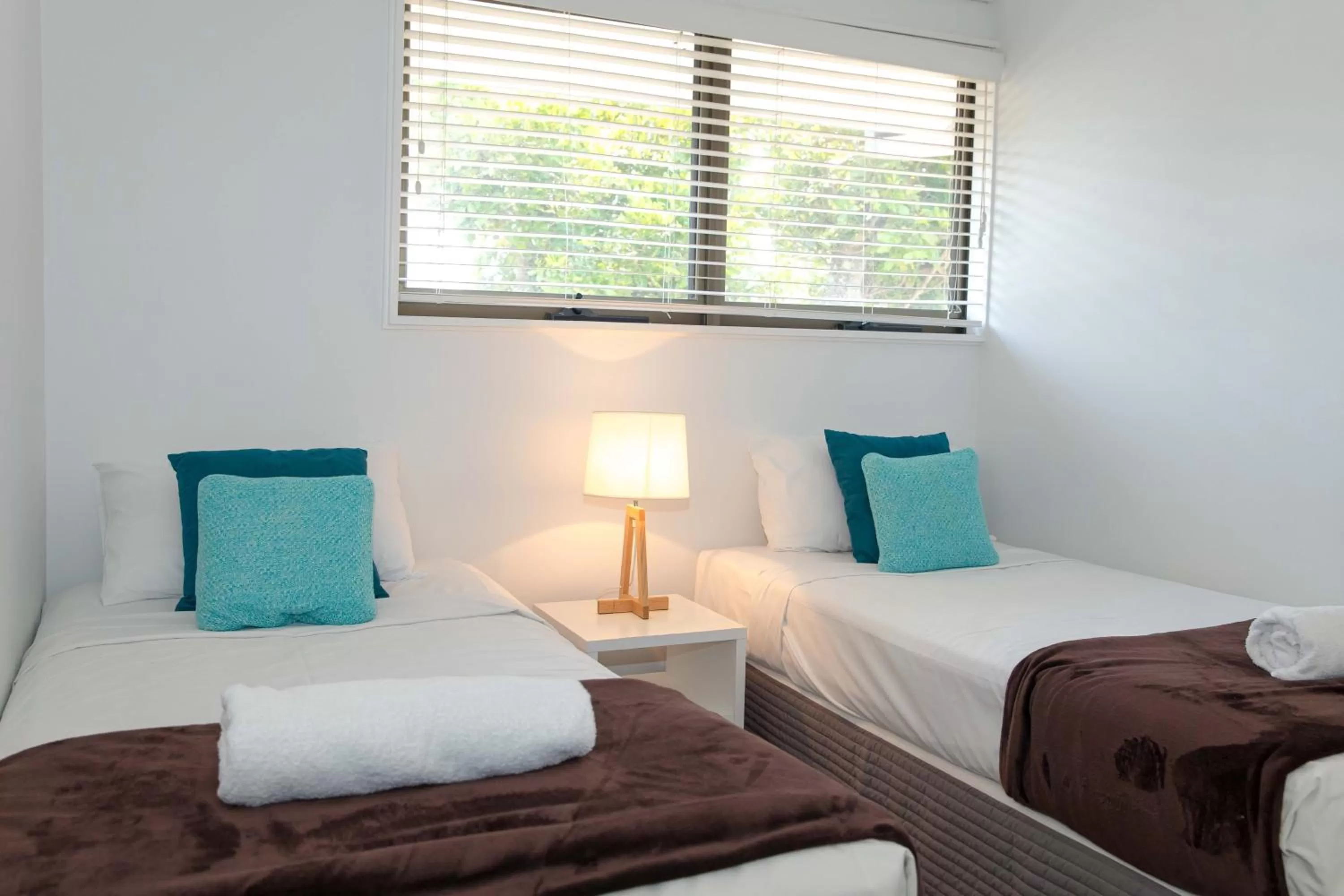 Bed in Glen Eden Beach Resort