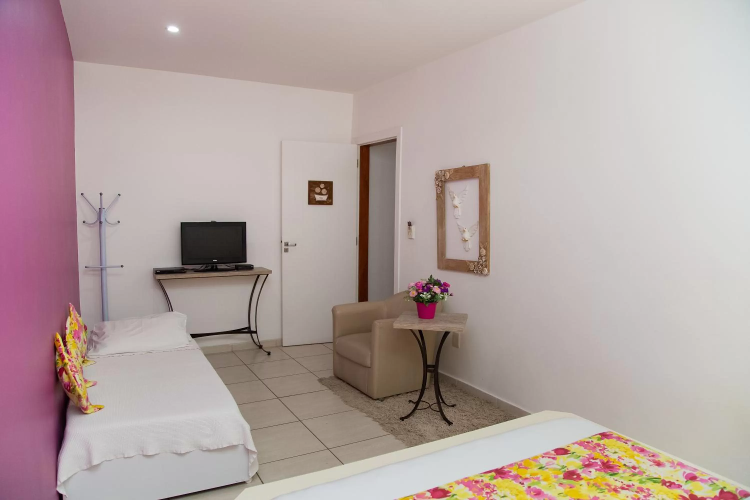 TV/Entertainment Center in Hospedaria Entre Amigos