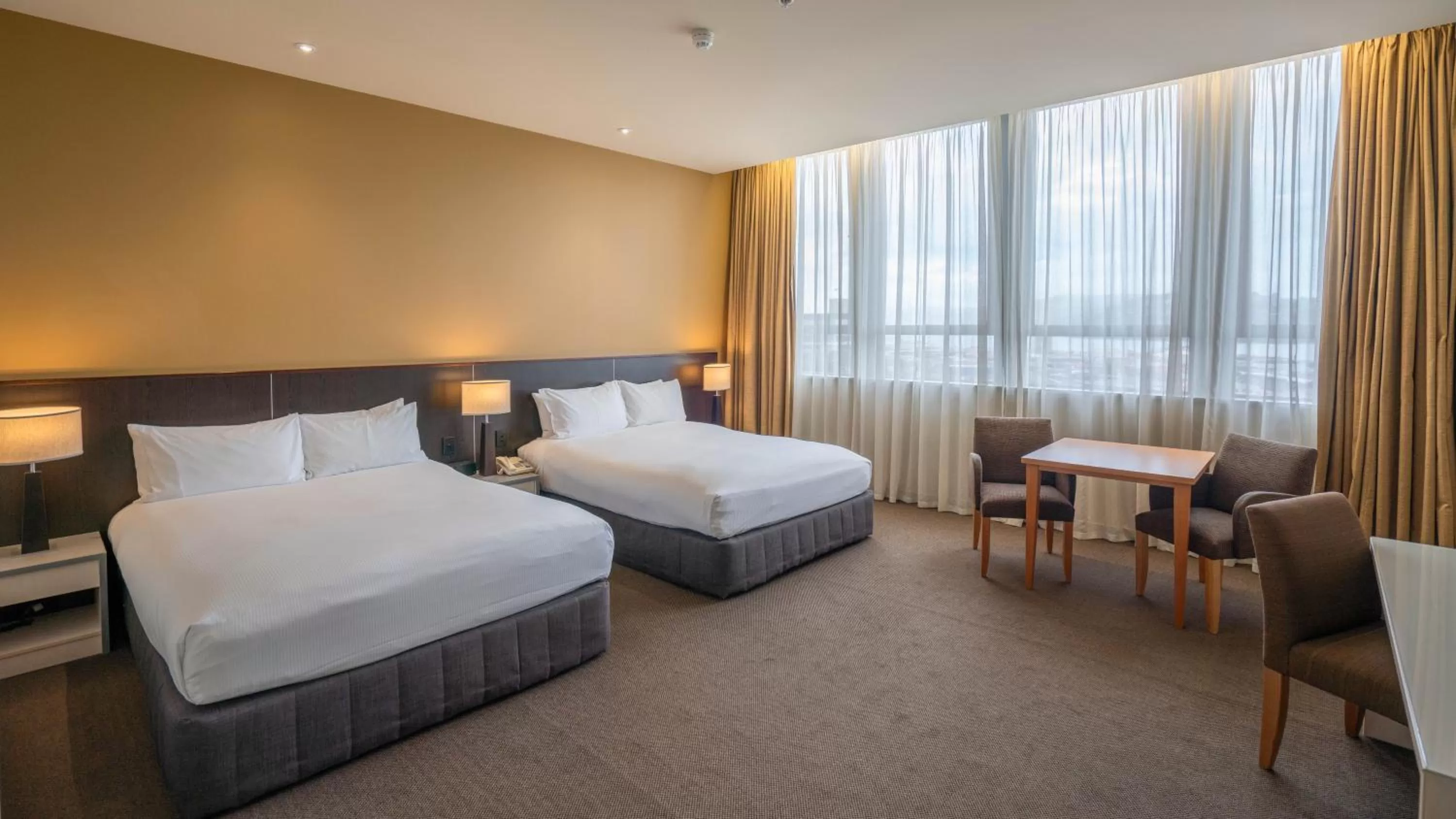 Bed in Scenic Hotel Dunedin City