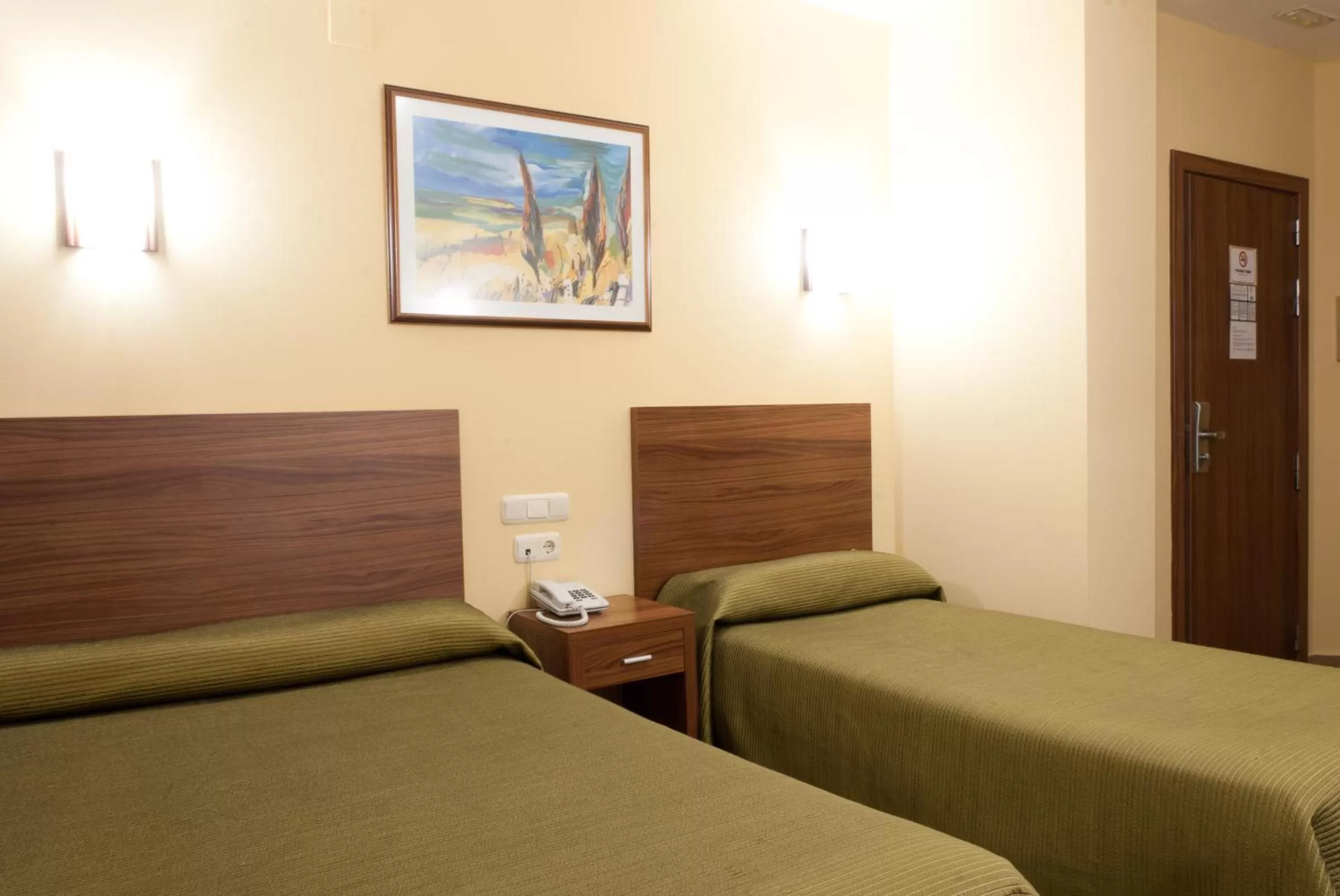 Bed in Hotel Hidalgo Quijada